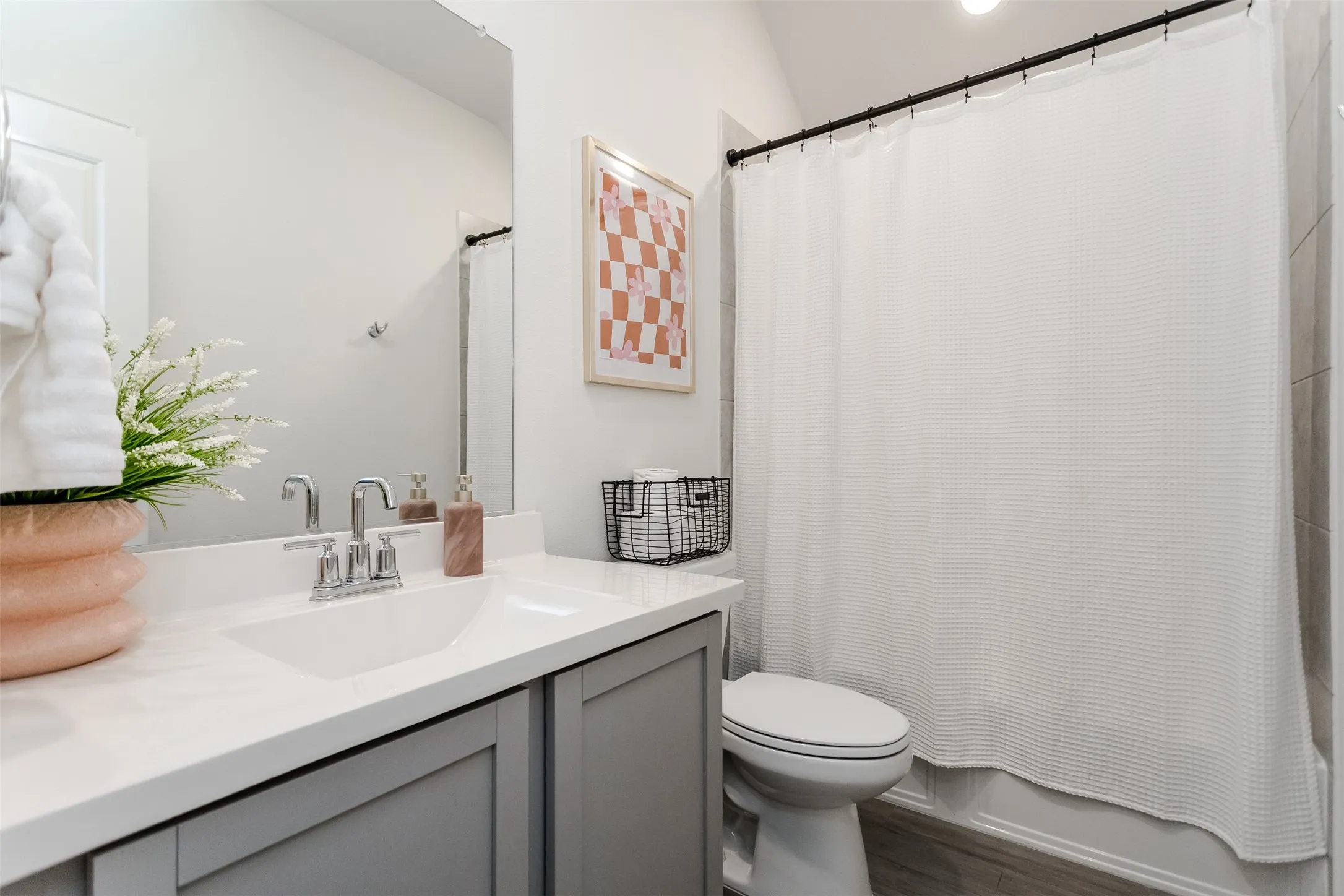 White countertop vanity with undermount sink and chrome faucet