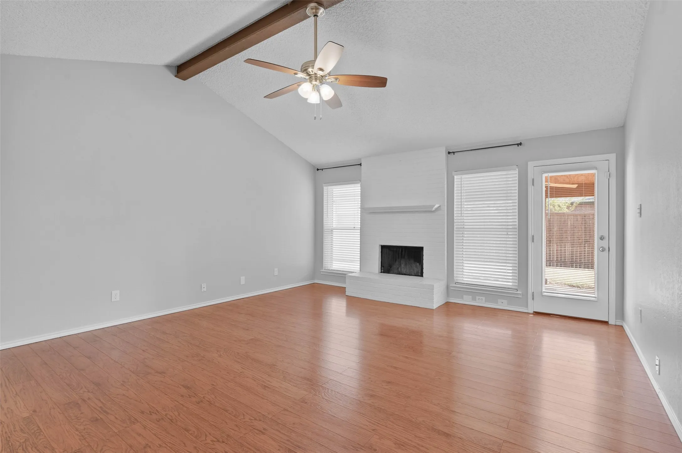 Living room with access to covered patio