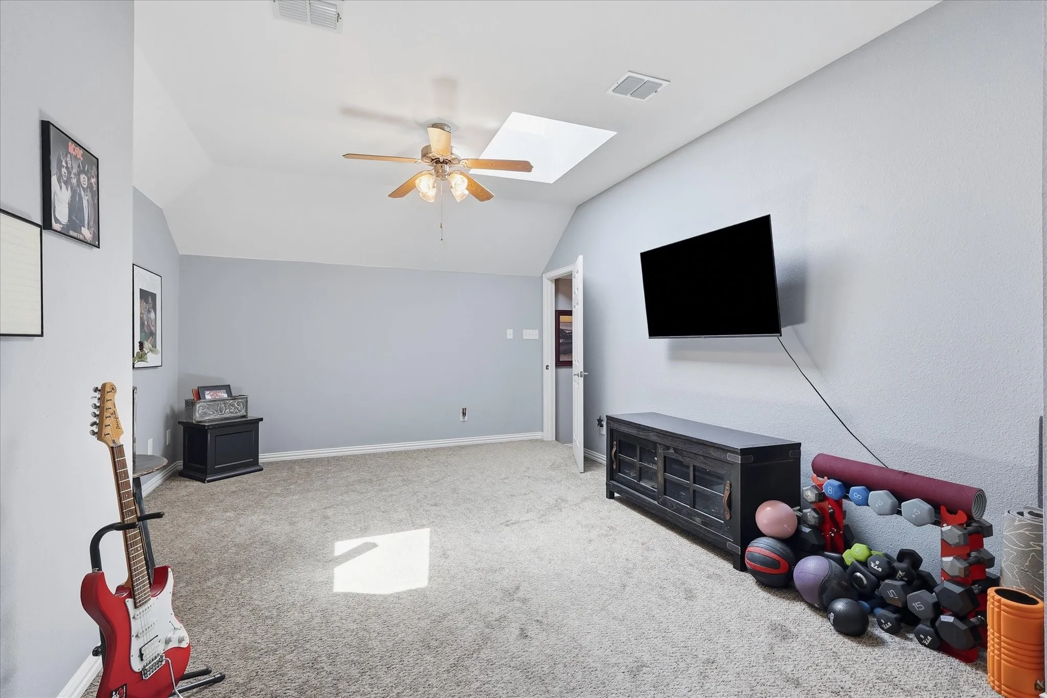 This is the bonus space everyone wants — a large upstairs flex room ready to become a game room, media space, home gym, playroom, or second living area.