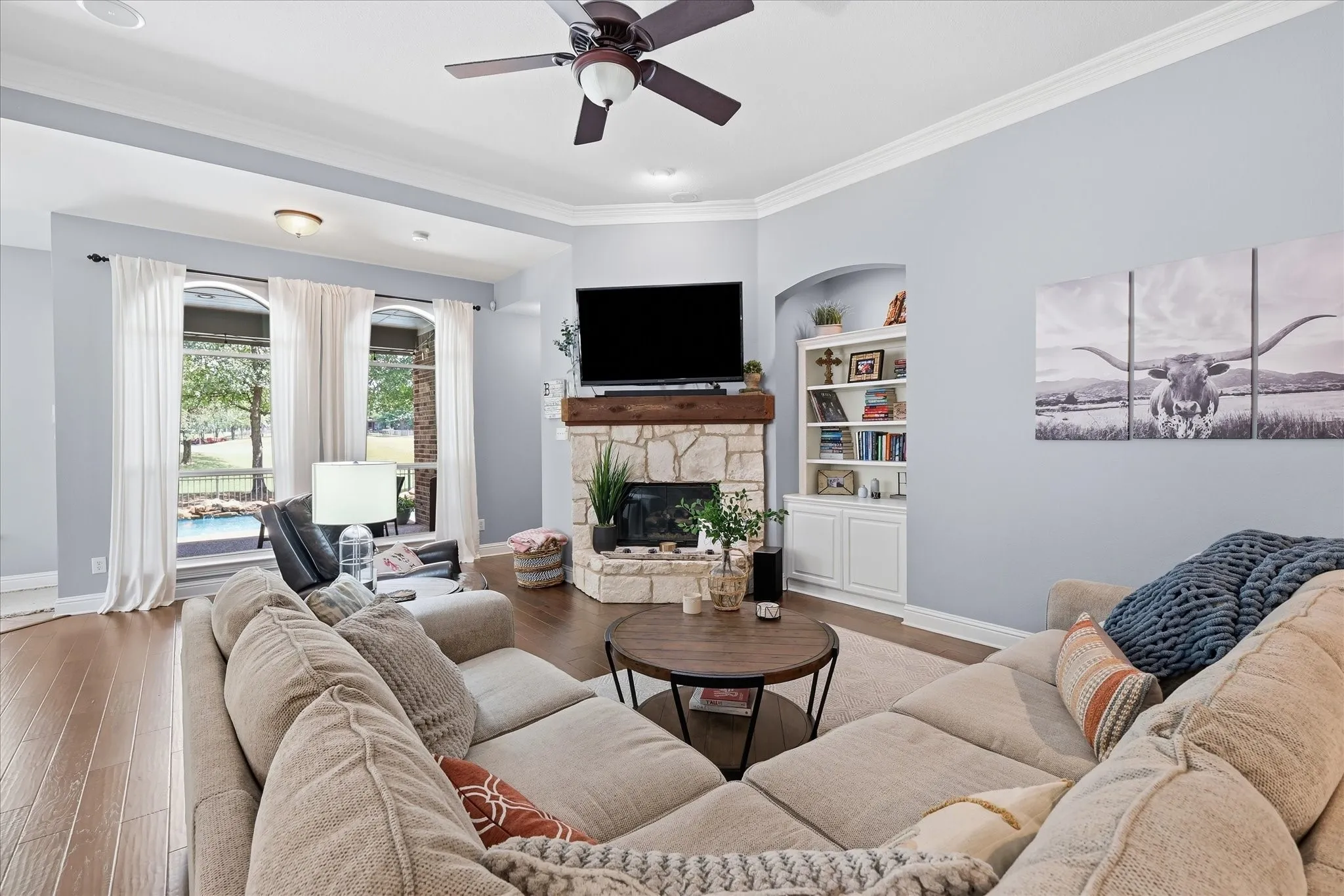 Plenty of room to gather, relax, and entertain — with oversized windows bringing the outdoors right into the living space.