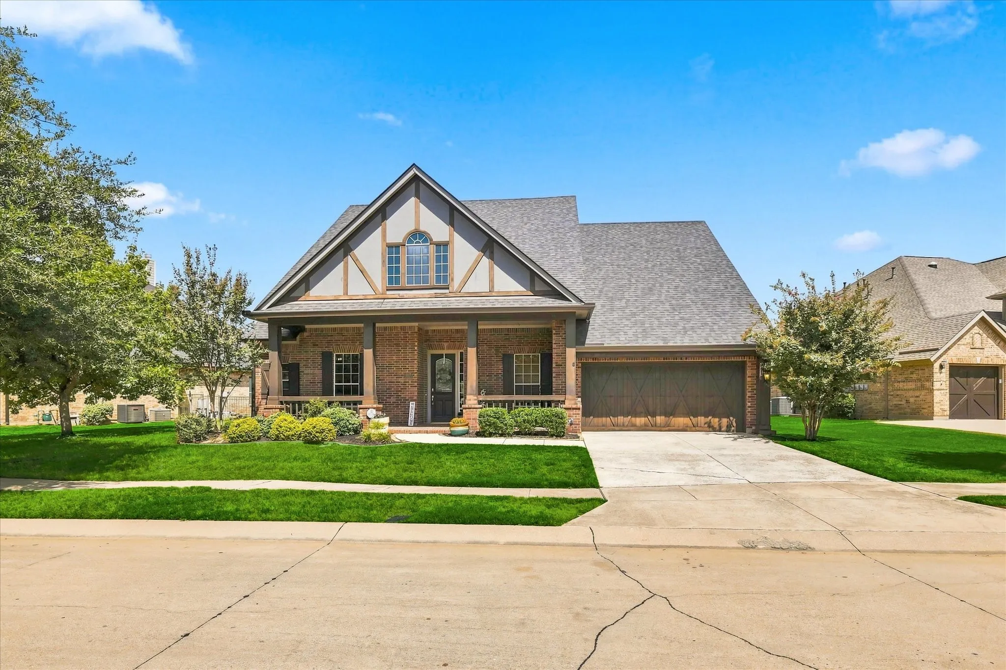 Welcome to 9355 Blanco Drive — timeless curb appeal, beautiful architectural detail, and a front porch that instantly feels like home.