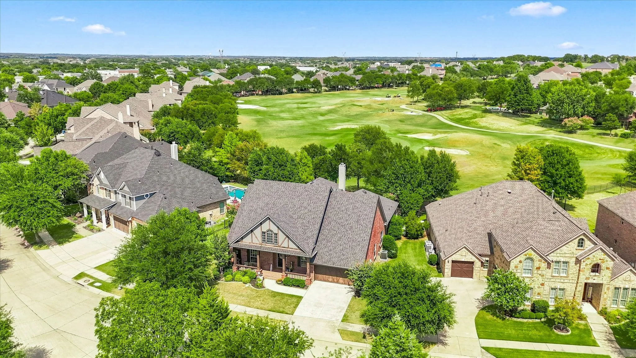 Ideally positioned in the neighborhood, this home stands out with exceptional curb appeal and a coveted golf course setting.