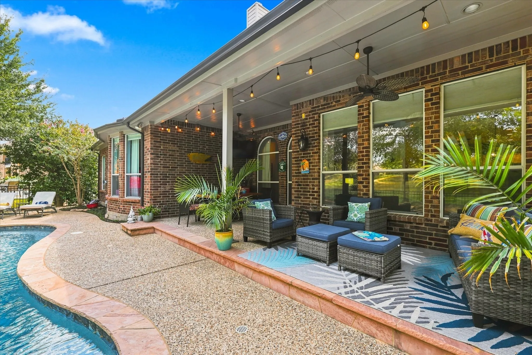 Outdoor living at its best — a spacious covered patio designed for relaxing evenings, casual entertaining, and year-round enjoyment.