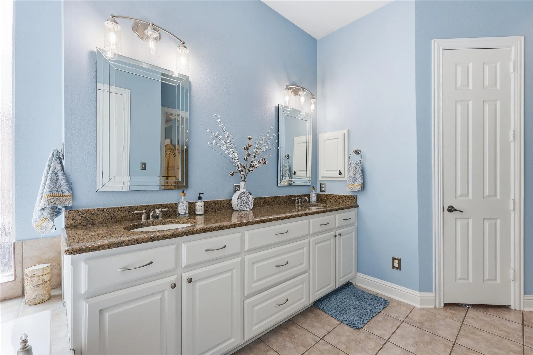 Room for two and then some. An oversized dual vanity offers plenty of counter space, storage, and a clean, polished feel.
