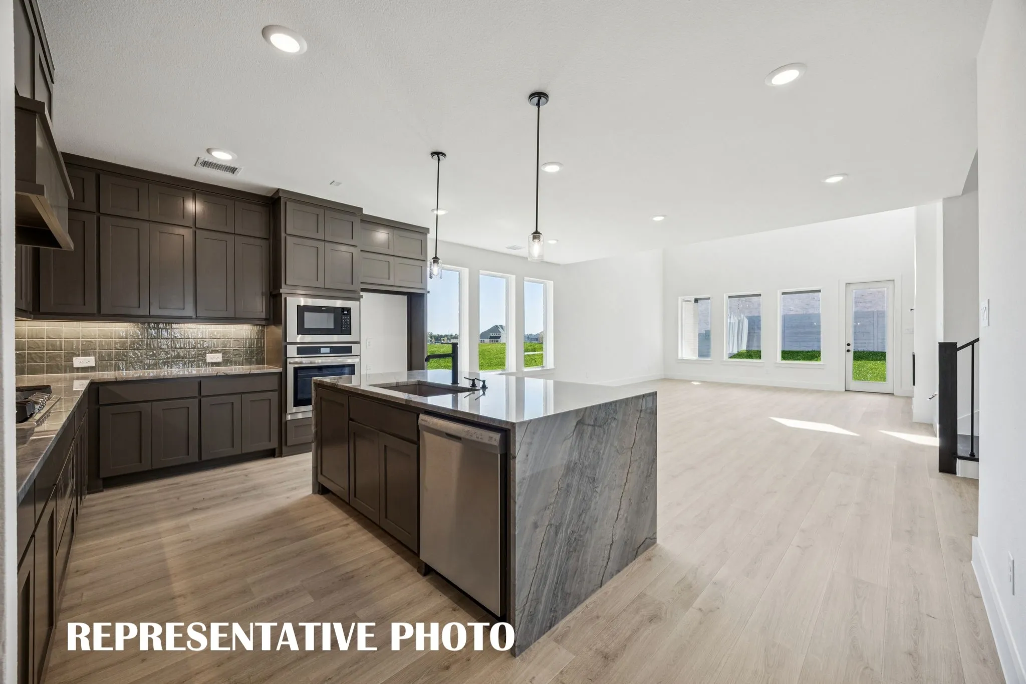 Packed with space, storage and style, this dream kitchen is calling your name! REPRESENTATIVE PHOTO