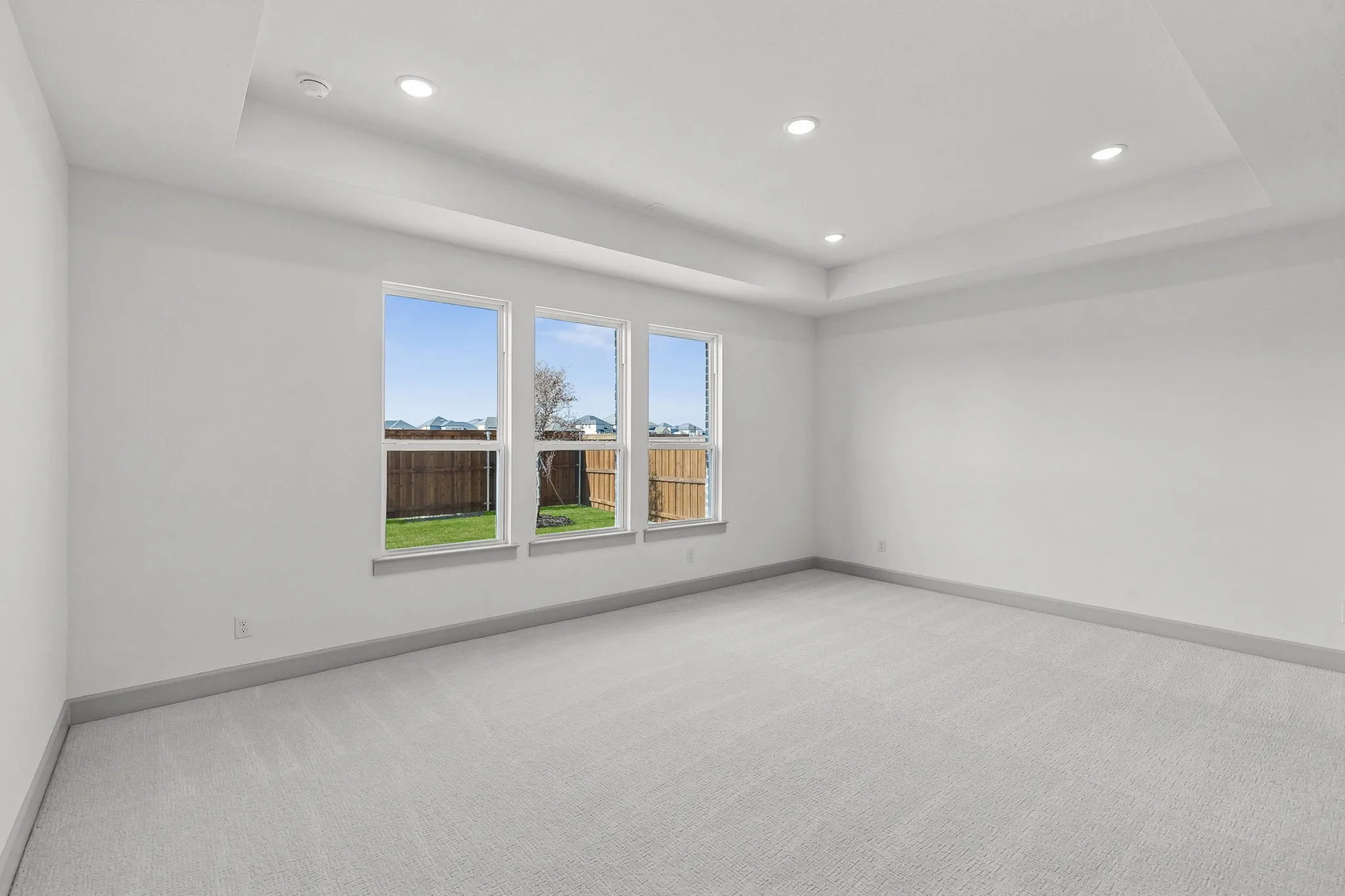 The peaceful owner's suite is located at the back of the home for additional privacy.