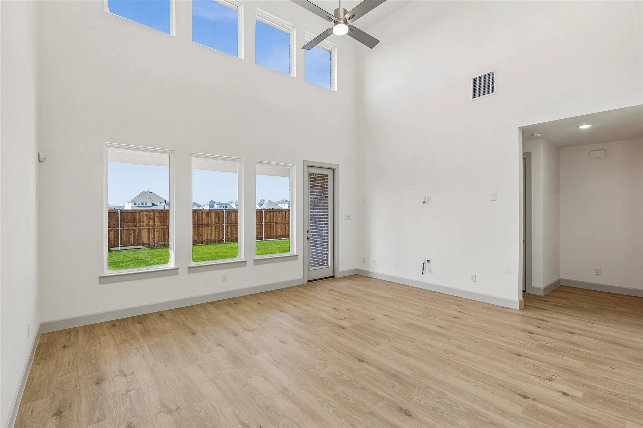 With floor to ceiling windows, this home is flooded with natural light both upstairs and down!