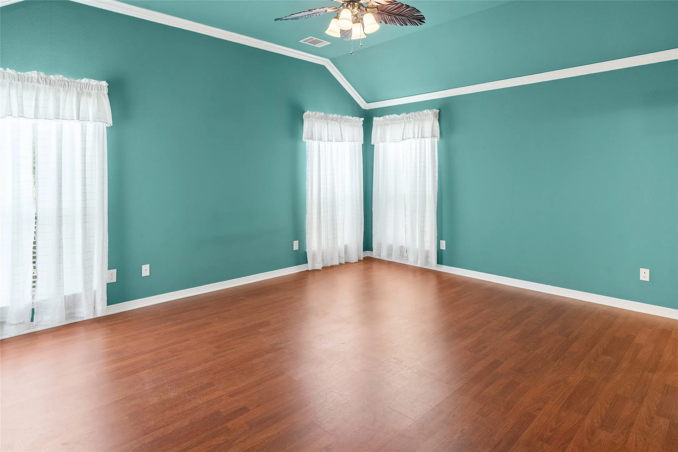 Wood-finish flooring with a vaulted ceiling
