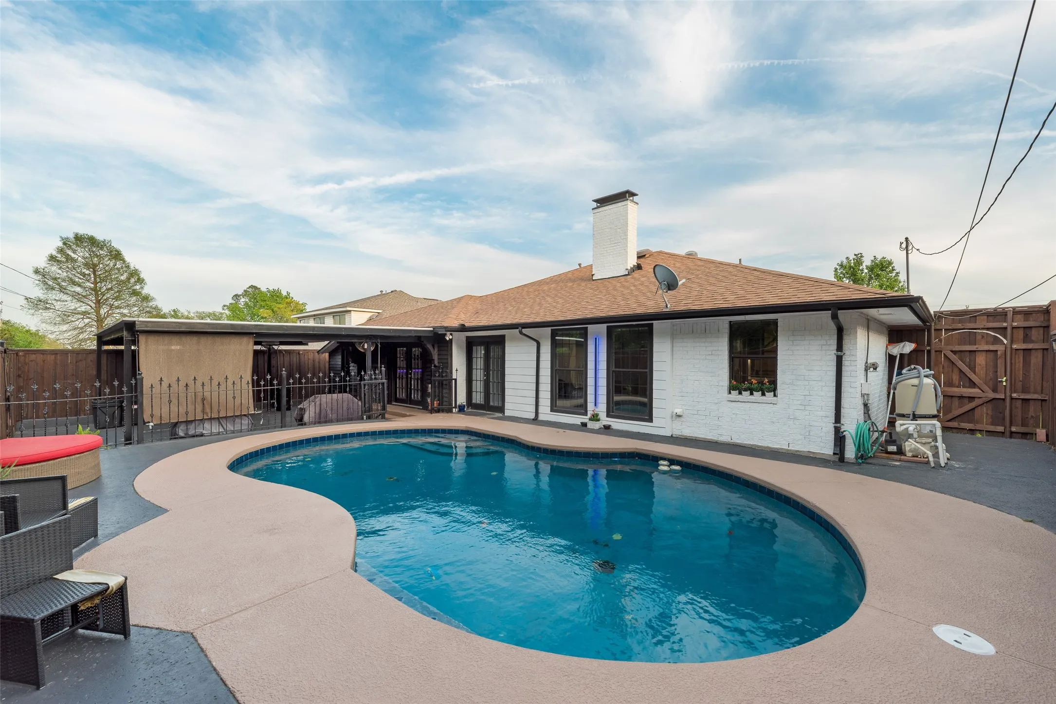 View of pool featuring a patio area and a fenced backyard