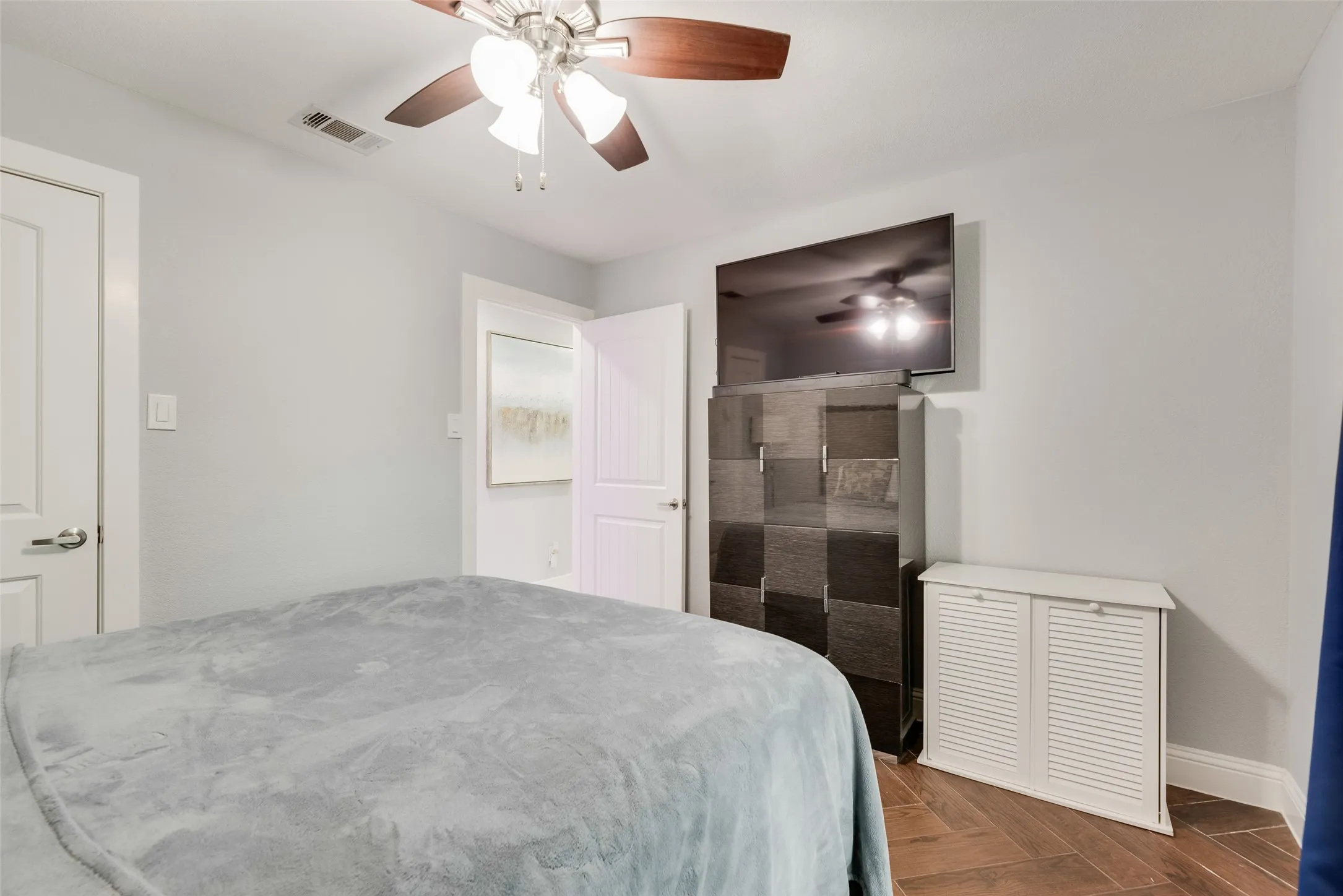 Bedroom with baseboards and ceiling fan