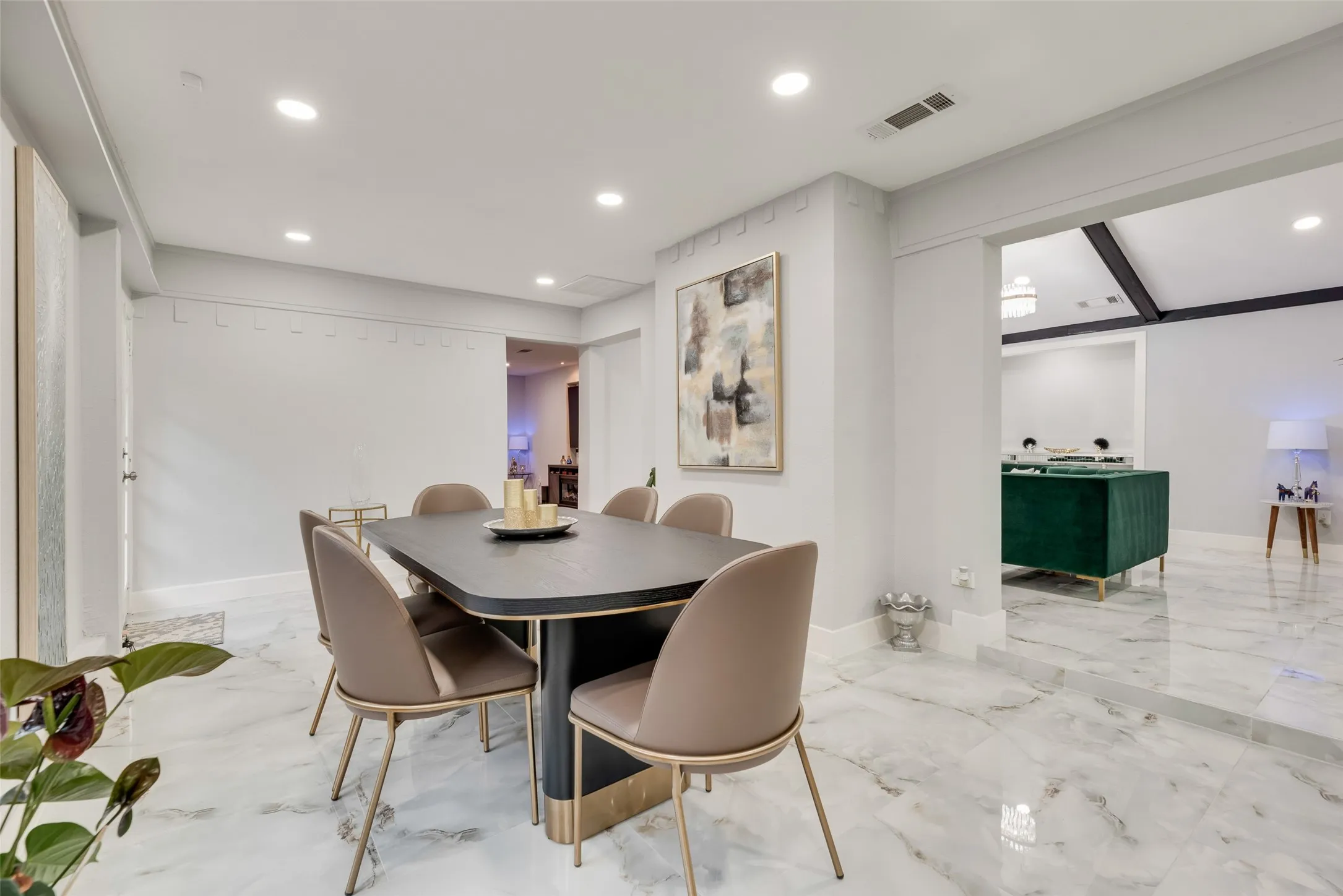 Dining space featuring recessed lighting, marble tiled floors, and baseboards