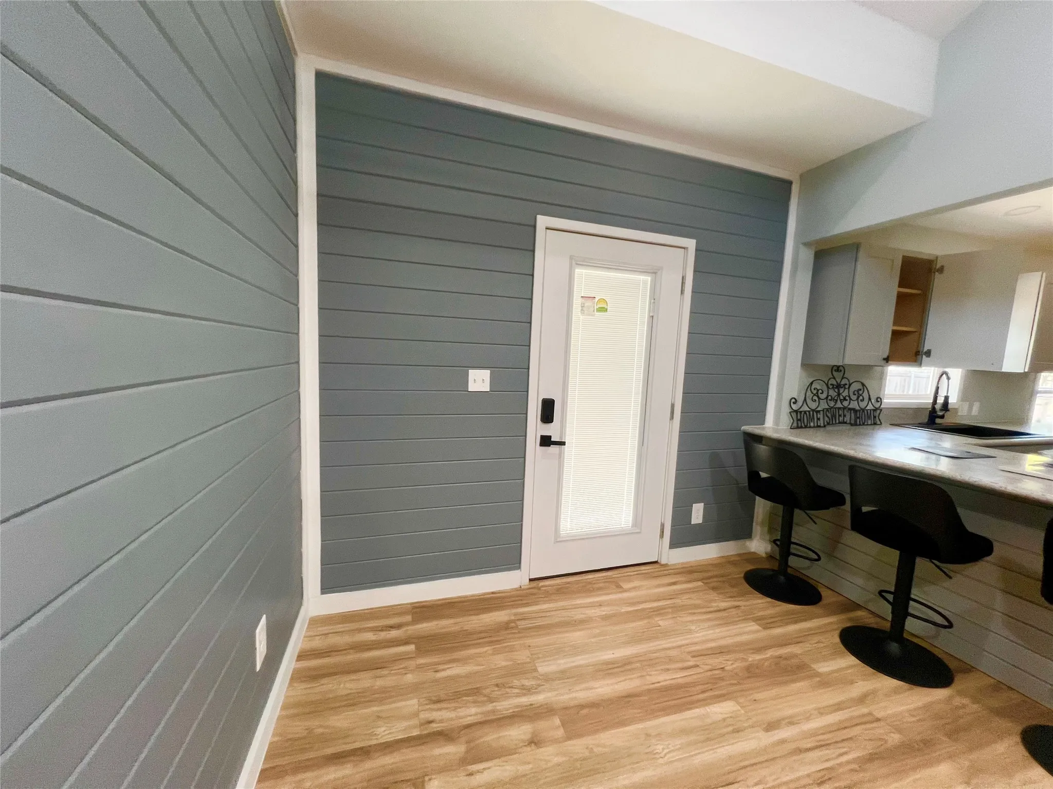 Backdoor with trendy built-in blinds.