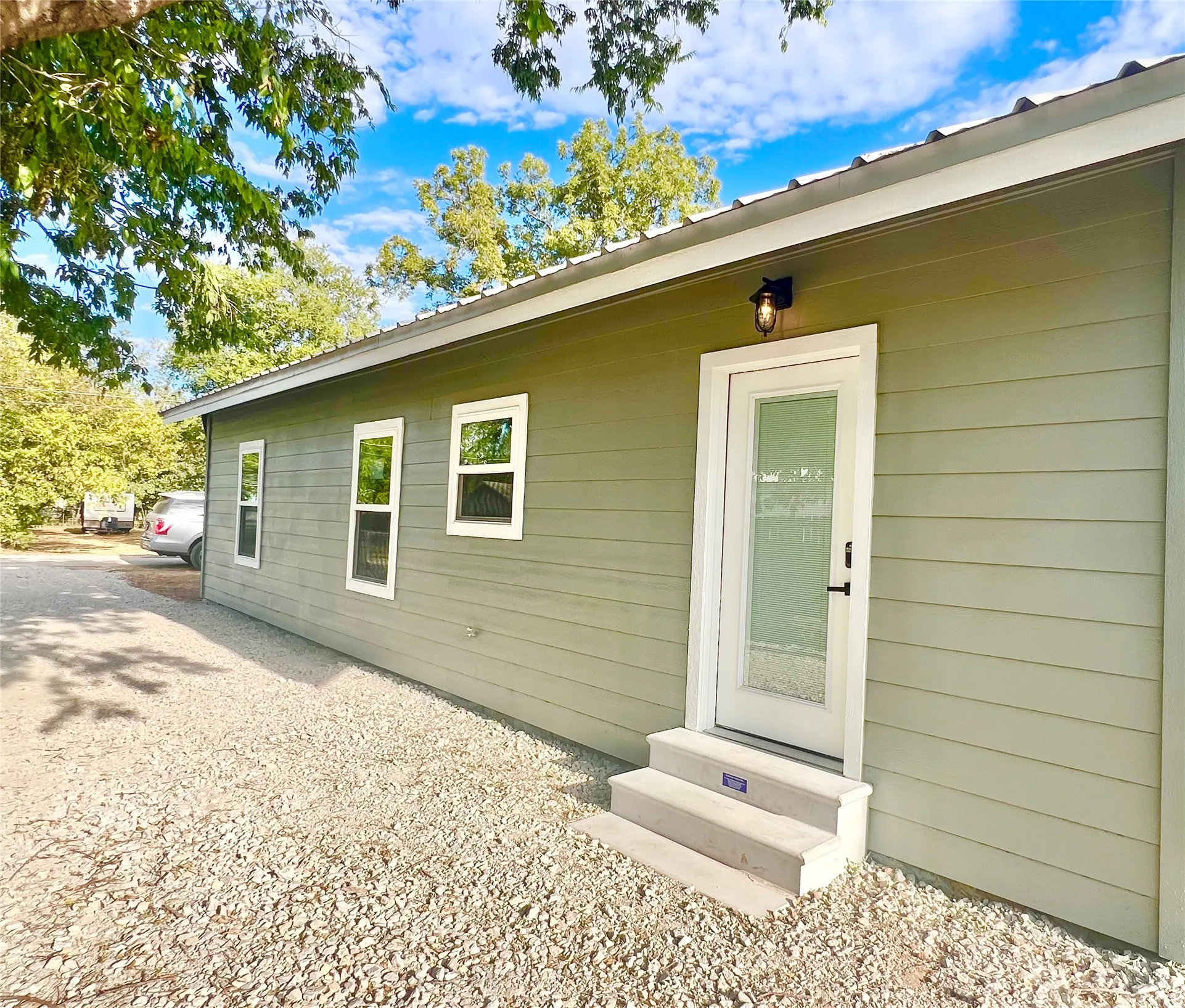 Side entry from caliche driveway