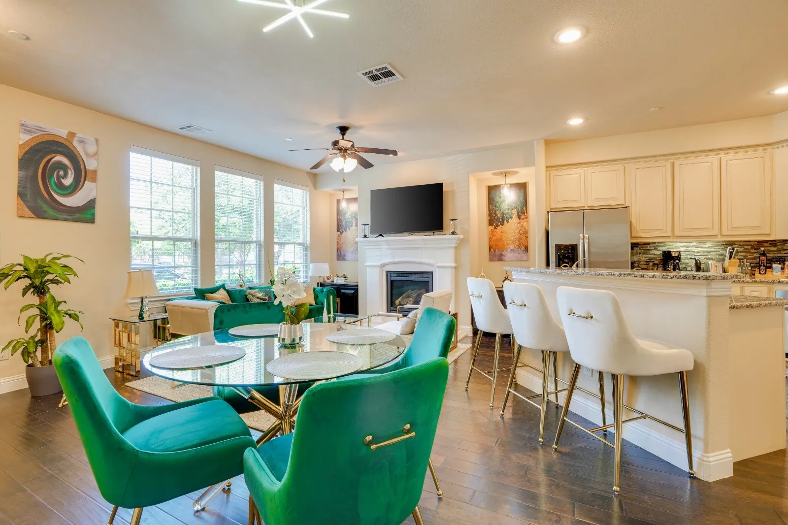 Hardwood-finish flooring throughout, multiple large windows, recessed lighting, and a kitchen island with built-in​​‌​​​​‌​​‌‌​‌‌​​​‌‌​‌​‌​‌​​​‌​​ cabinetry