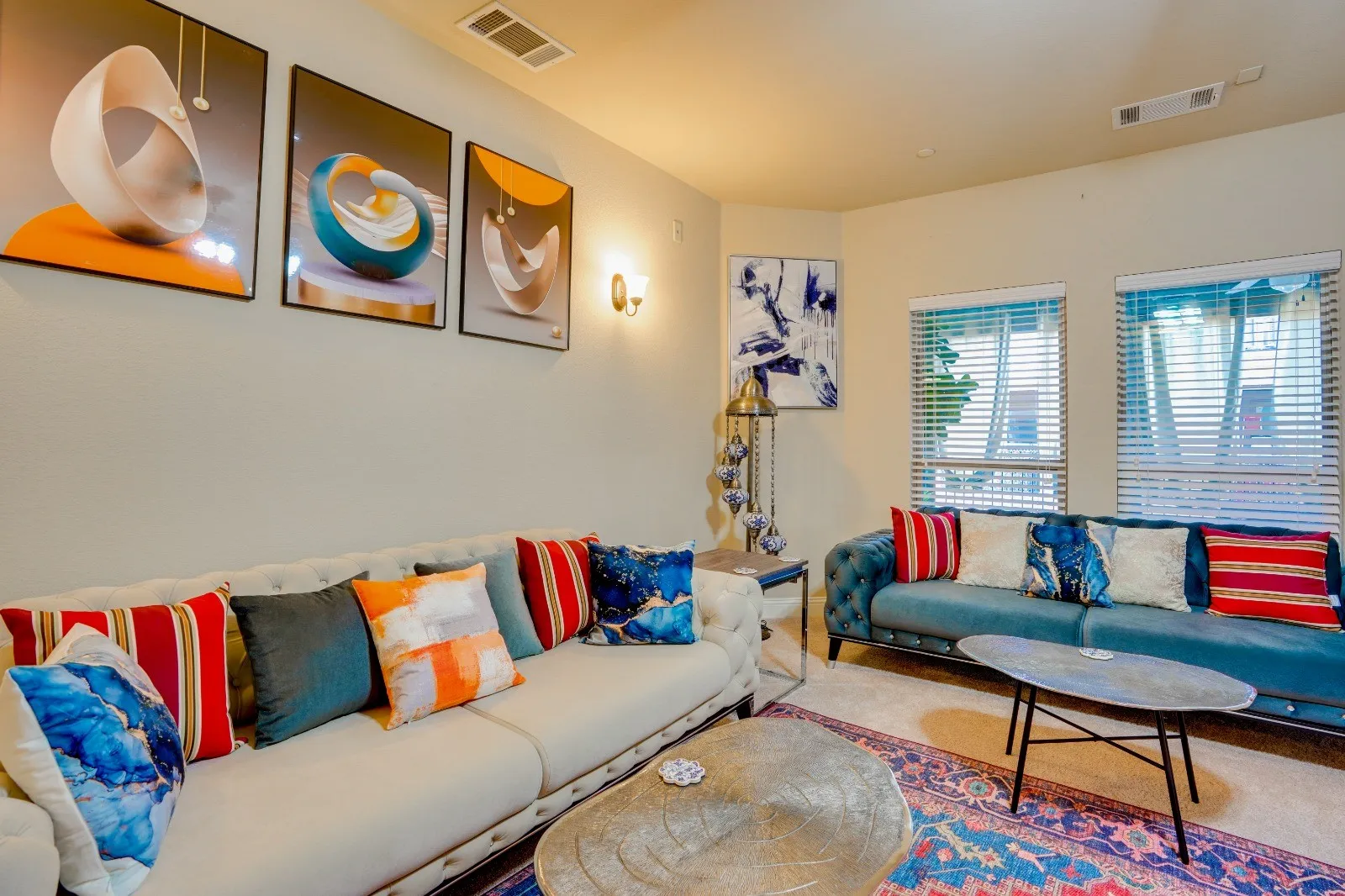 Recessed lighting, wall sconce, and two window openings
