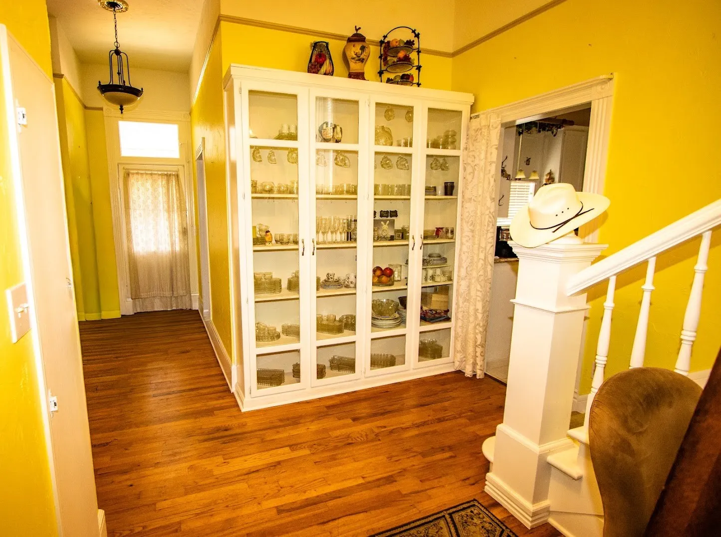 Side entry with built in cabinets.