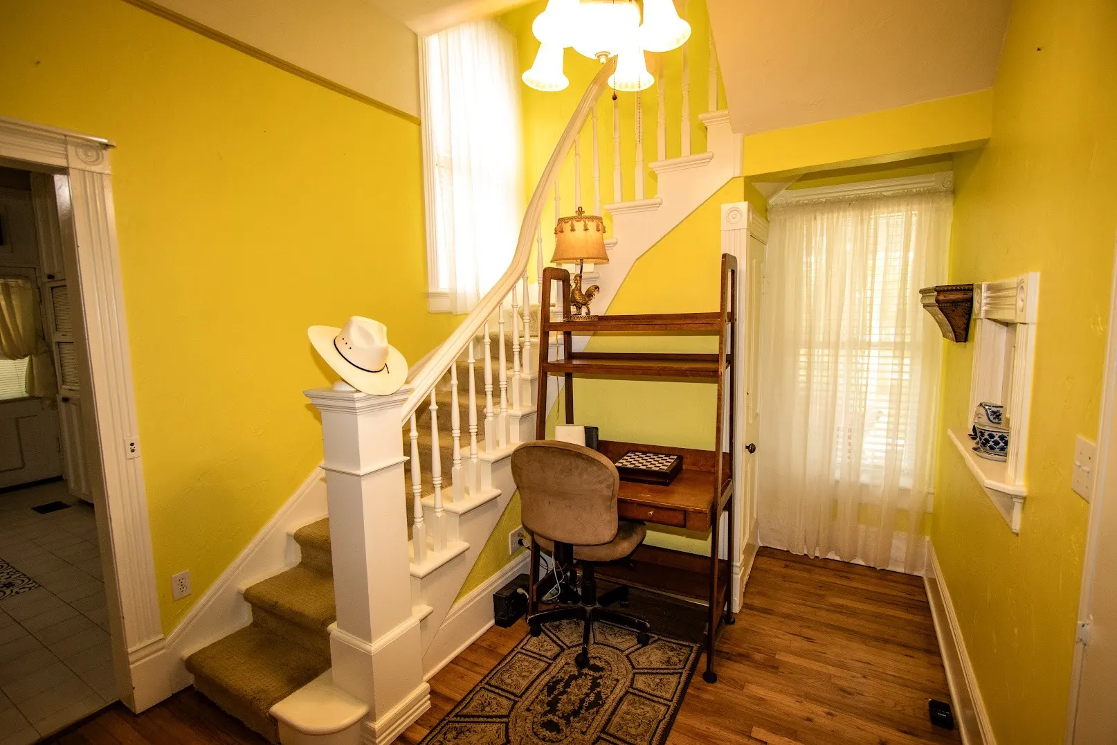 Side entry from a 2nd angle showing stairs and built in desk area