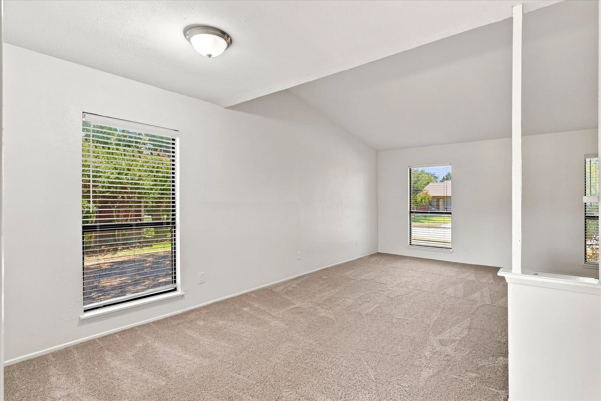 Dining room opens to large front living area - perfect for entertaining