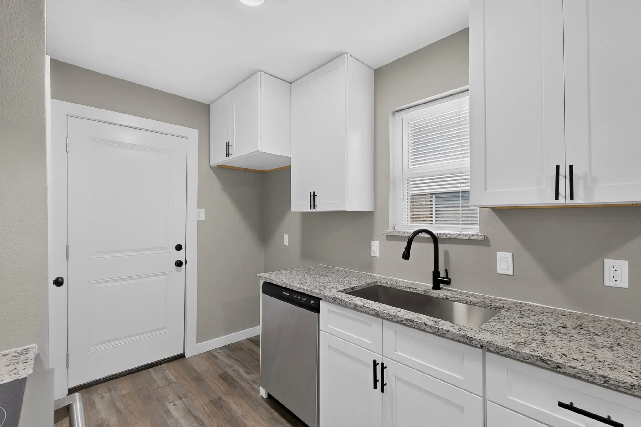 New Shaker tyle Cabinets and modern Black Fixtures and Hardware