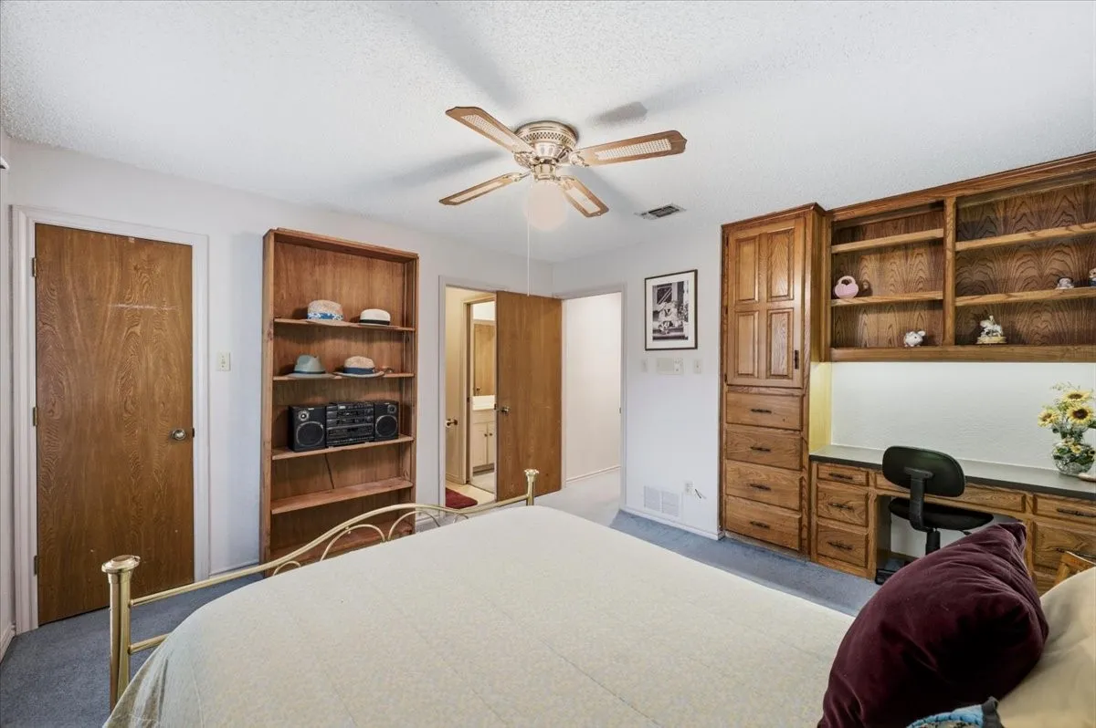 Bedroom 3 with private access to bathroom and built-ins!
