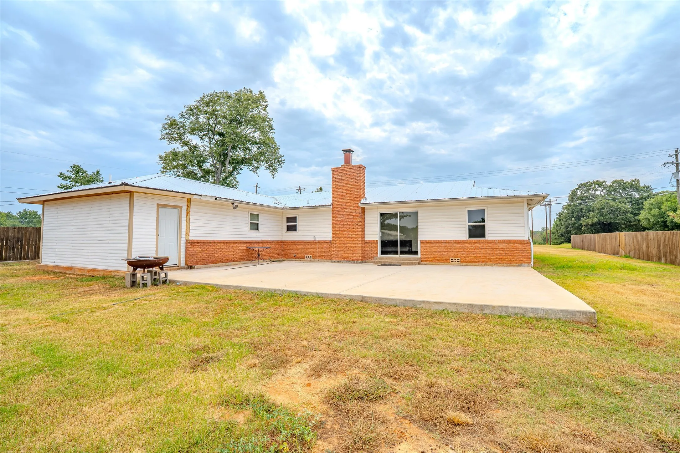 Look at that enormous concrete back patio!