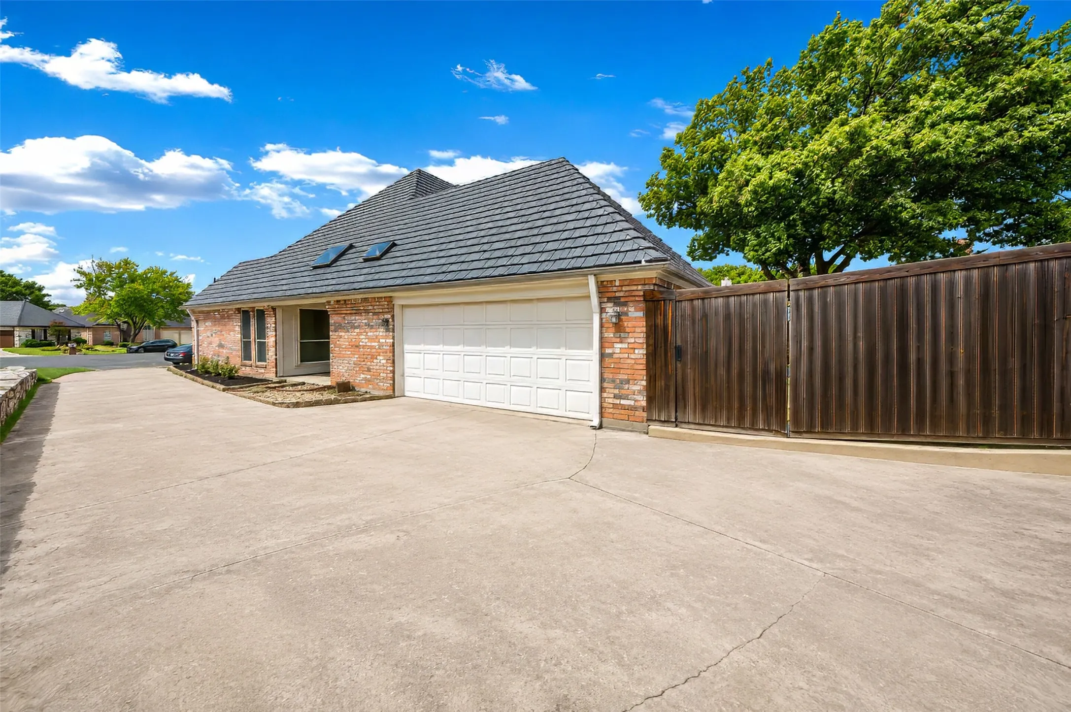 Side entry garage keeps vehicles out of sight!