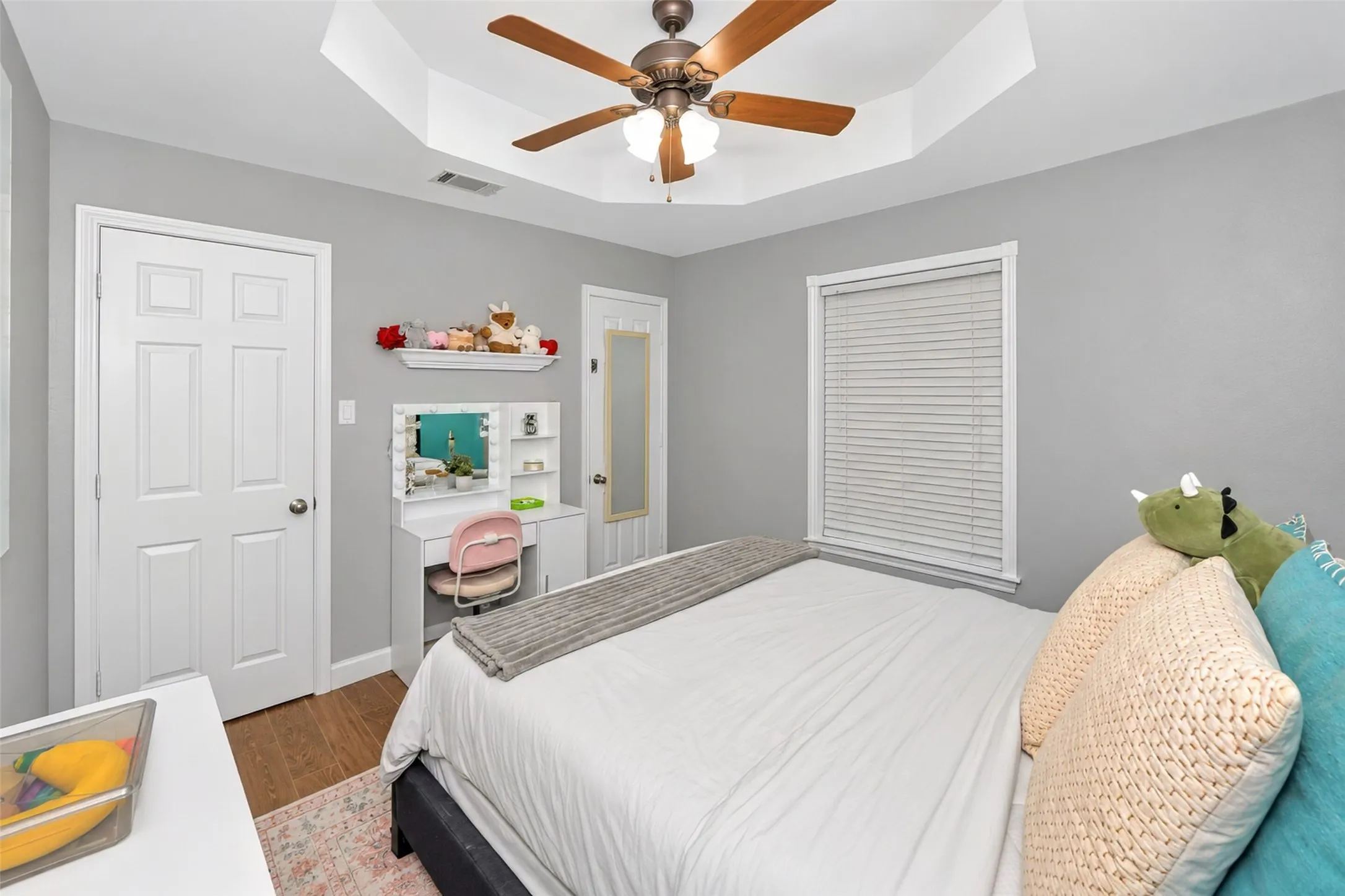 Bedroom 3 features a trayed ceiling and walk in closet.