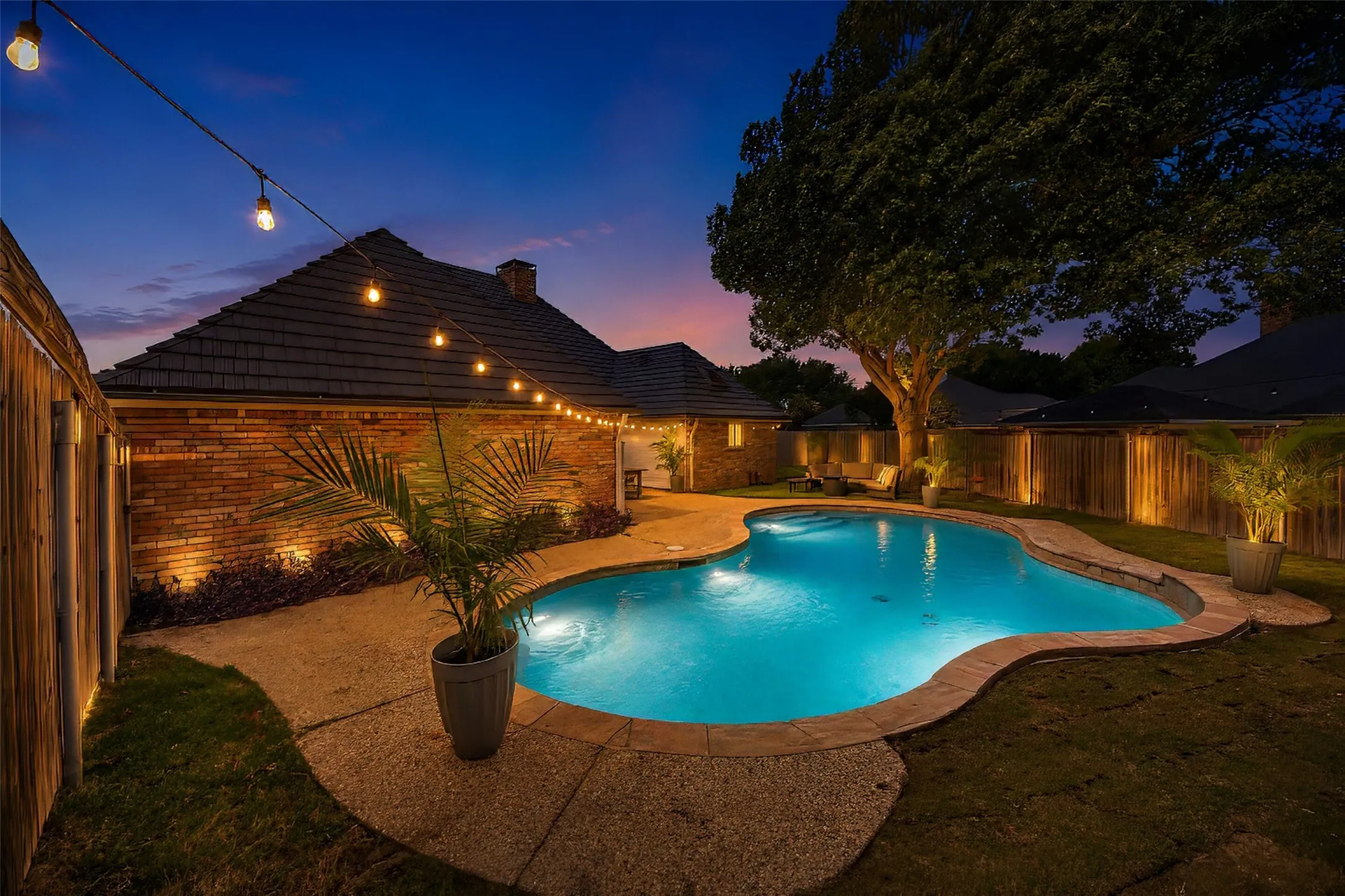 Pool area showing enhanced evening lighting.