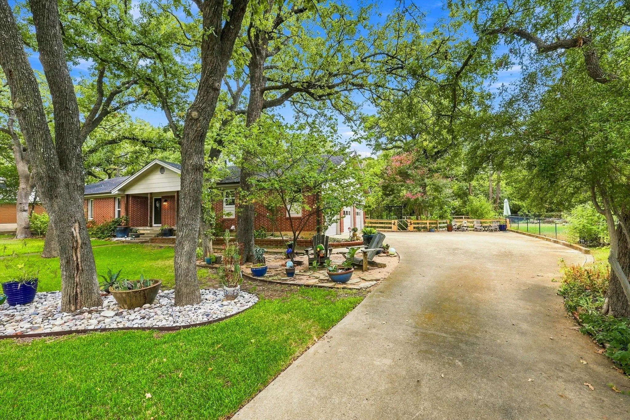 This home boasts a three car side entry garage with additional parking.