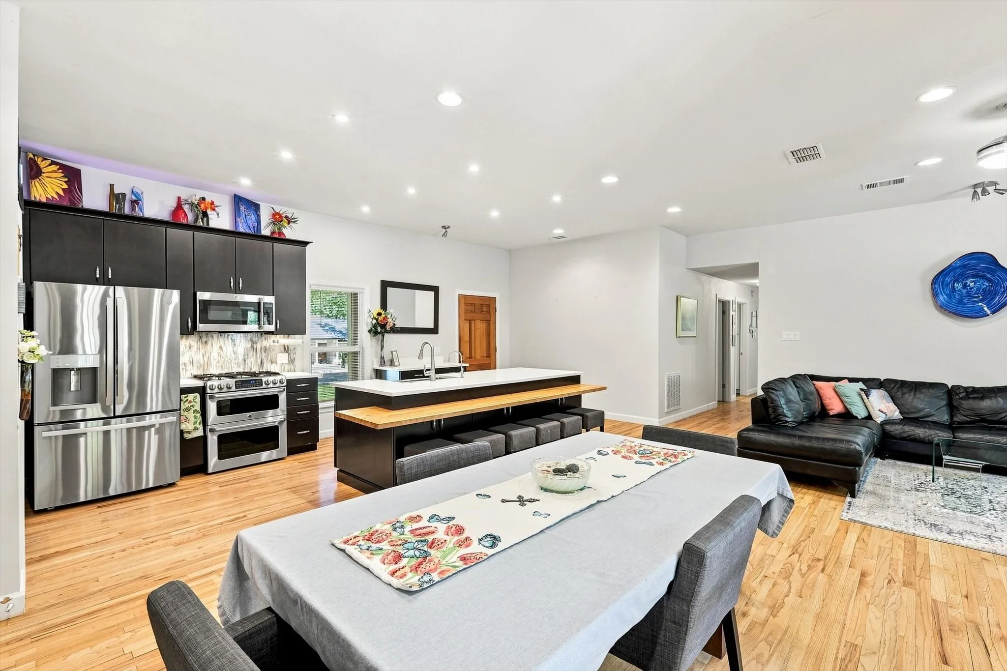 Dining room has recessed lighting and is wired for a center light.