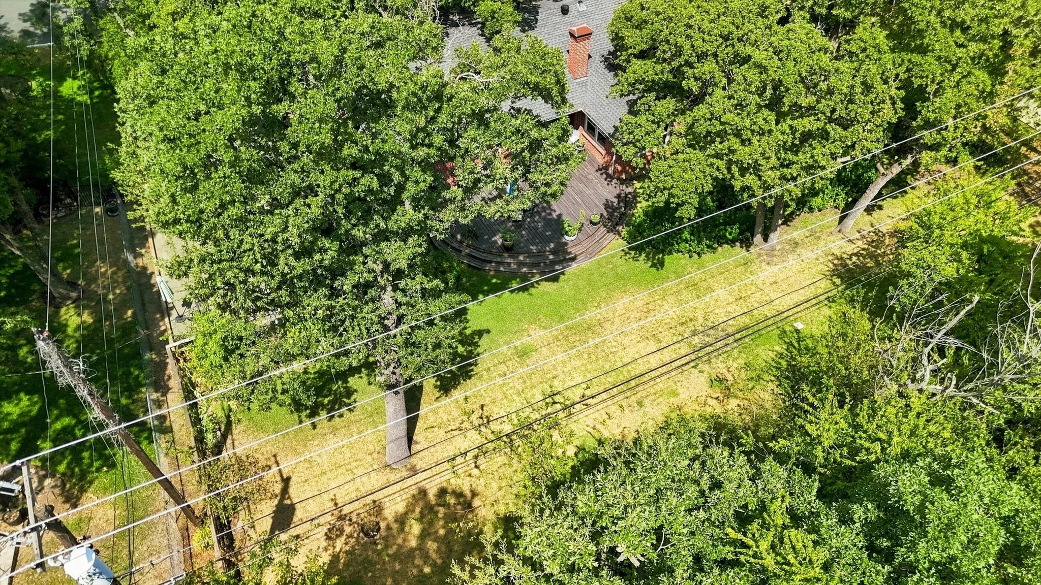 Aerial view of the backyard and deck.