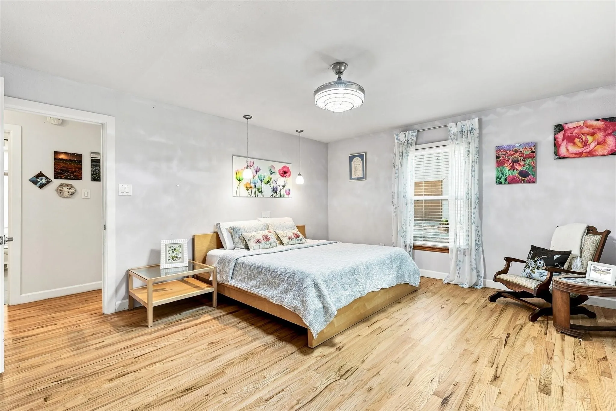 Primary bedroom was reconfigured to allow for more space. Pocket doors disappear when open to ensuite bathroom.