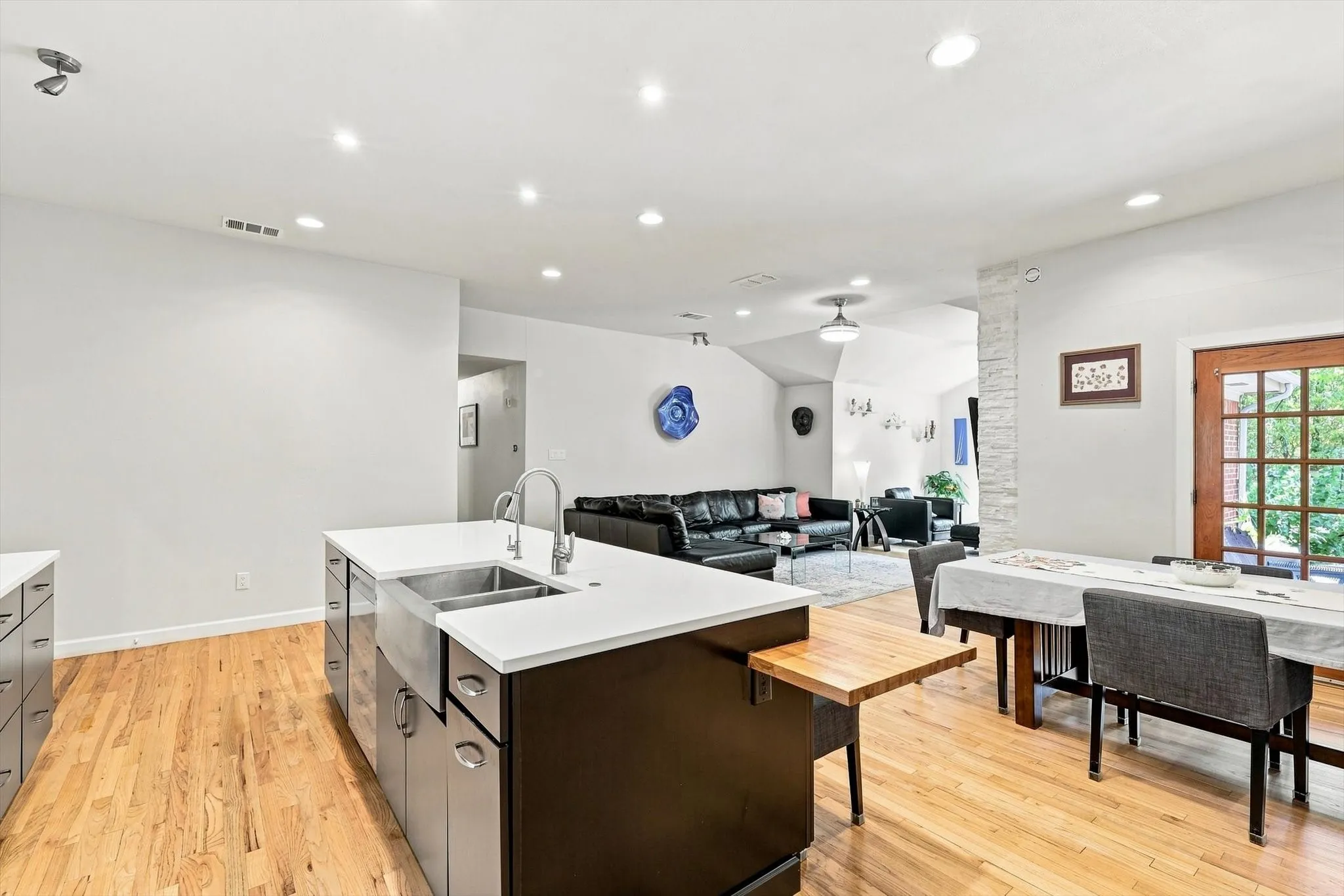 Kitchen is open to the dining and living areas.