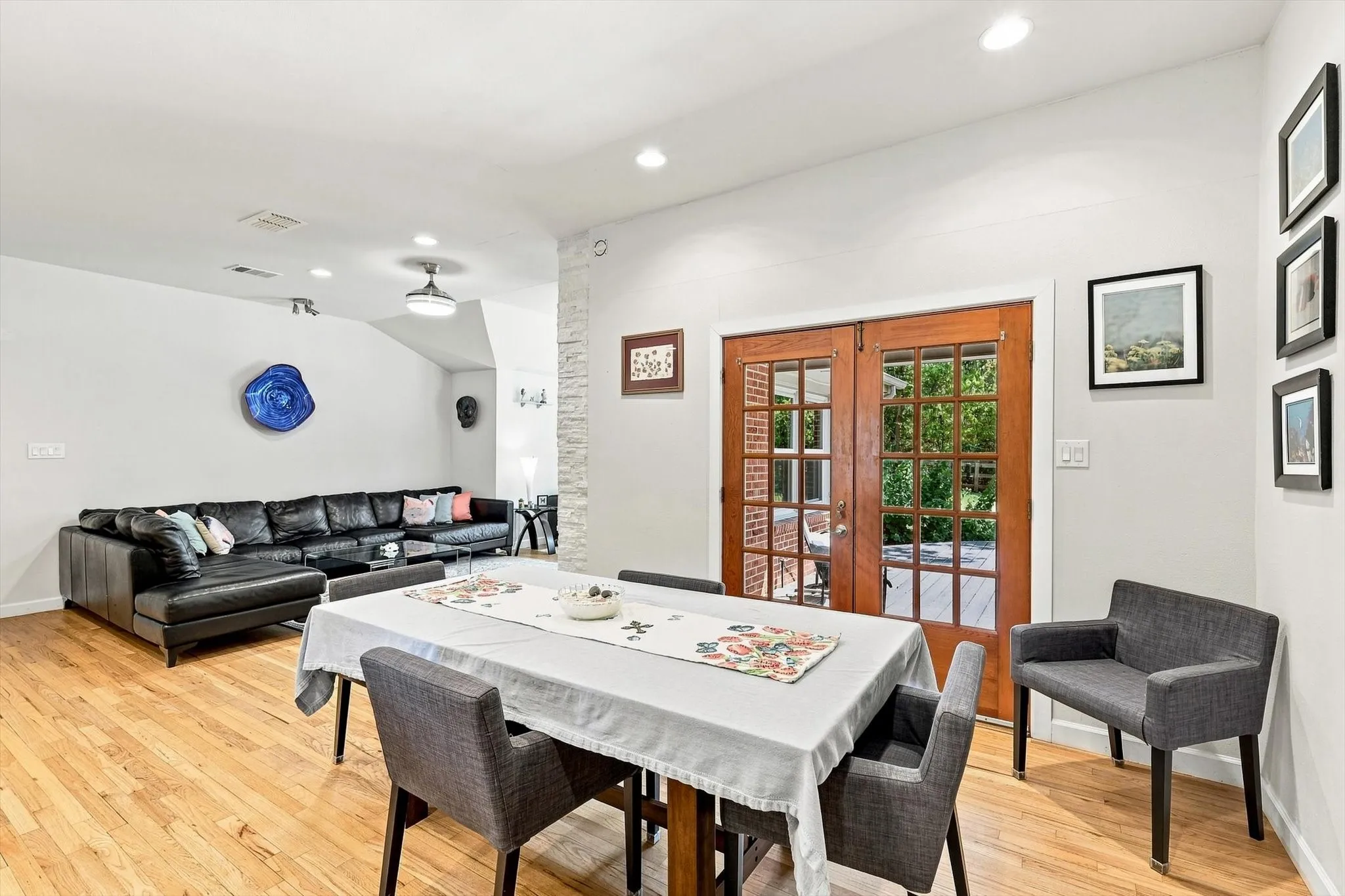 Double French doors lead from the dining area out to the wonderful deck and backyard.