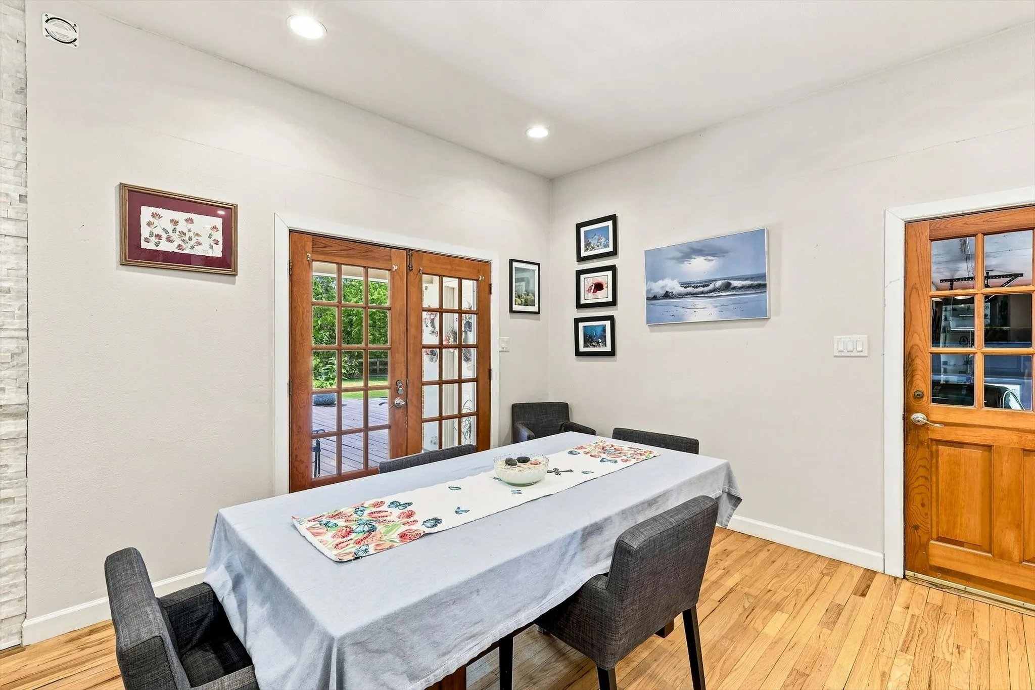 Dining room is spacious and can accommodate a large table.