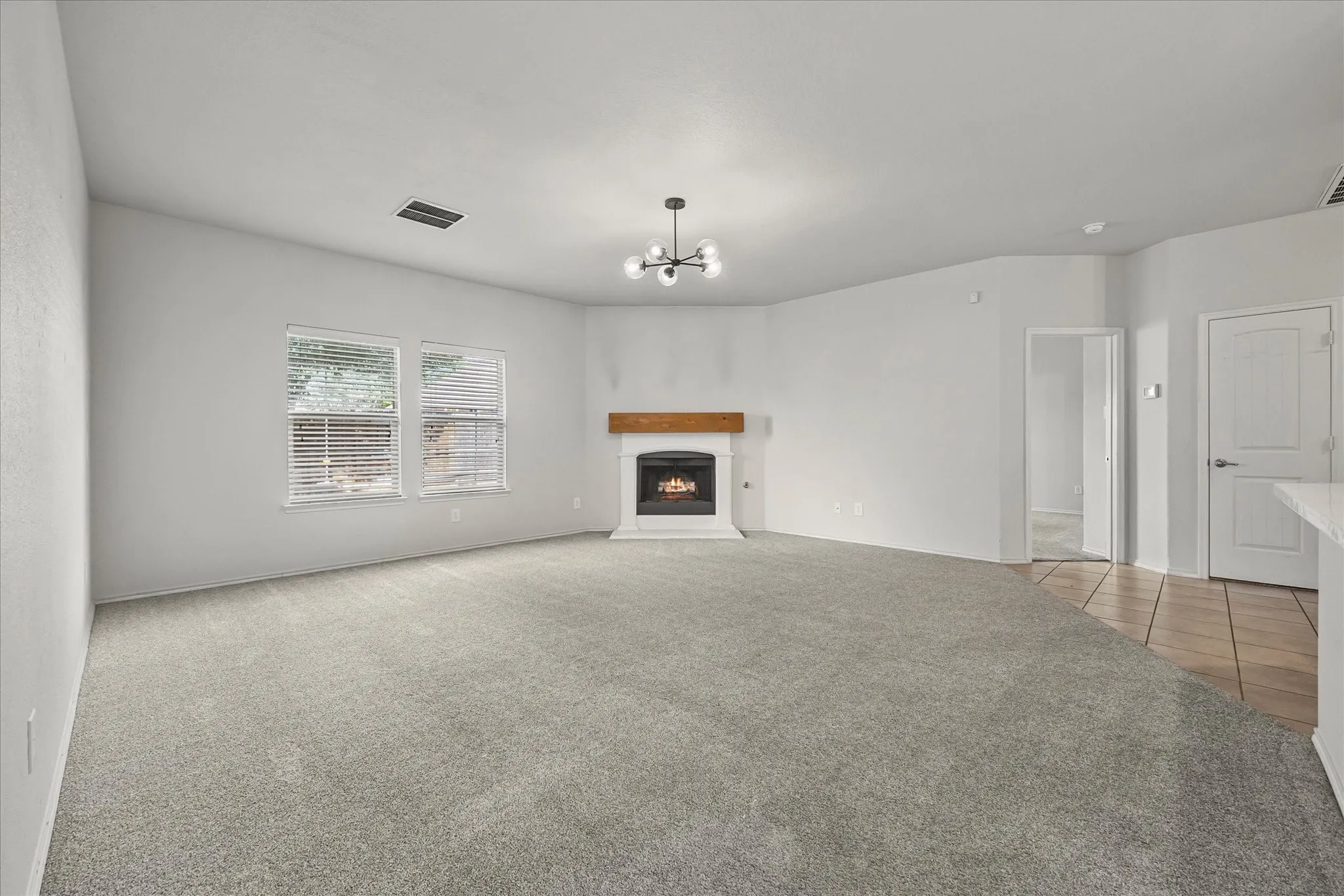 Living room with wood burning fire