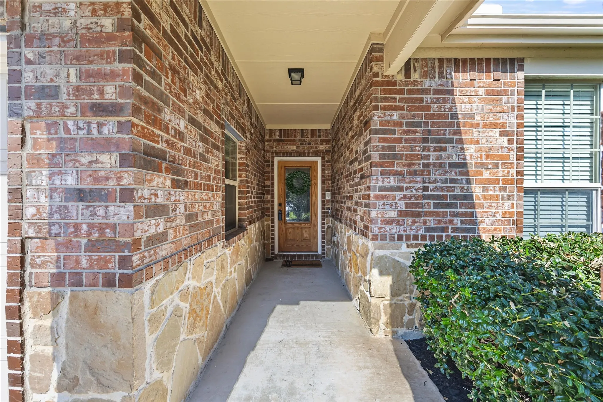 Covered porch to welcome guests