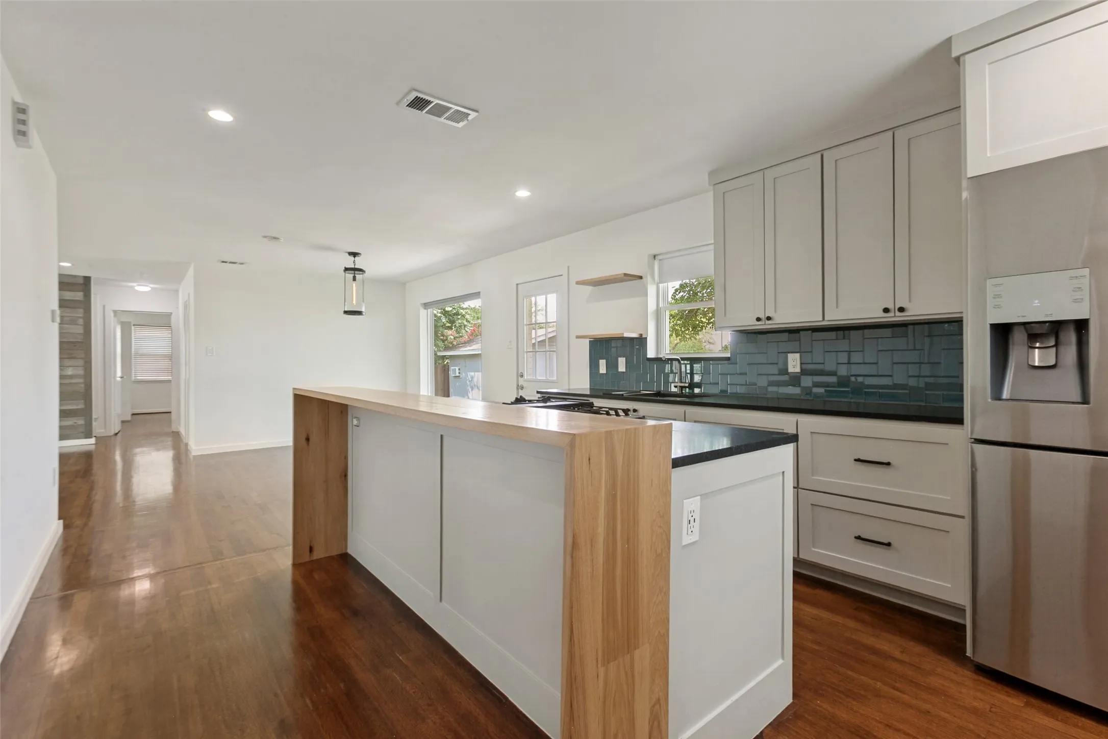 View of kitchen looking into dining room