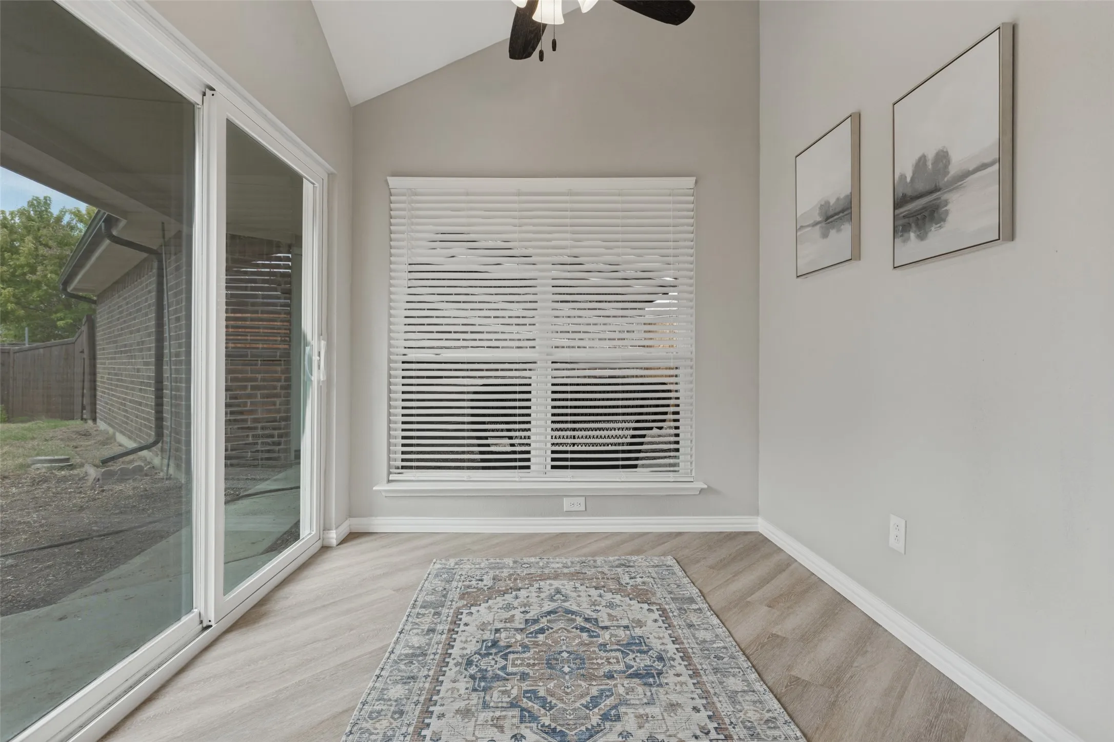 Lovely breakfast area with wall of windows ushering in natural light for morning coffee and breakfast!
