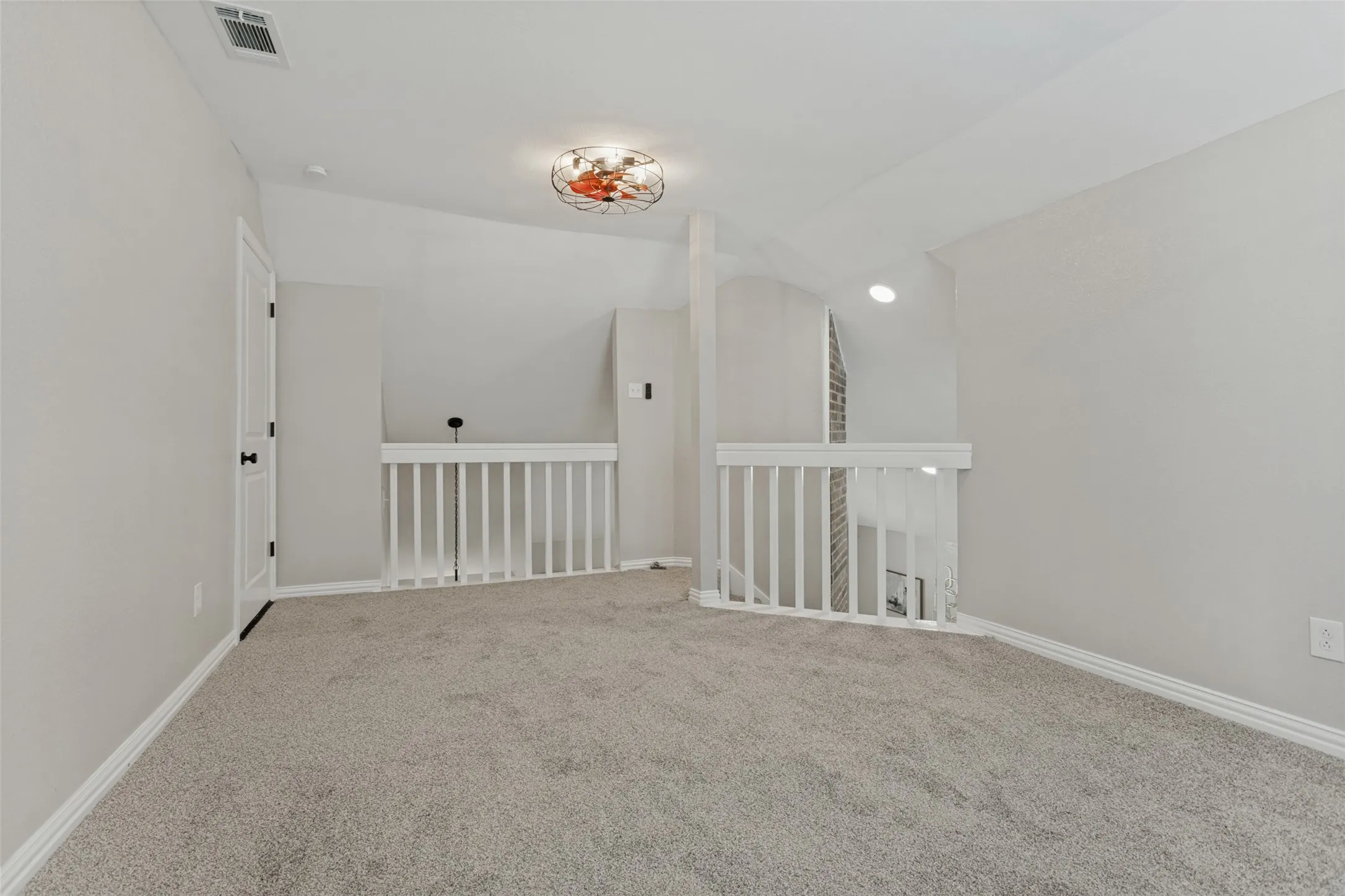 Upstairs room for library, office space or family room.