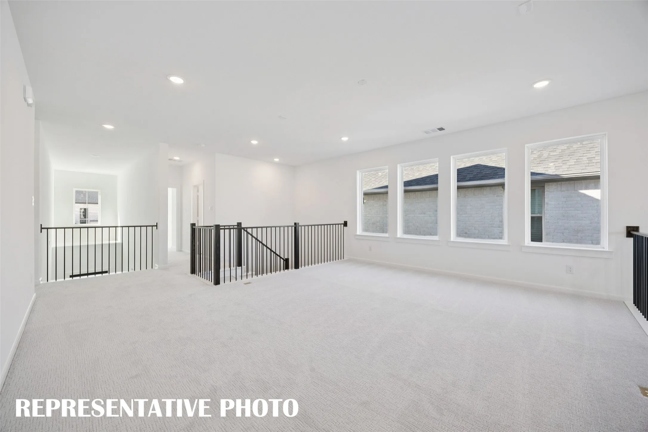 Light, bright and airy, the fun times never end in this over the top game room!  REPRESENTATIVE PHOTO