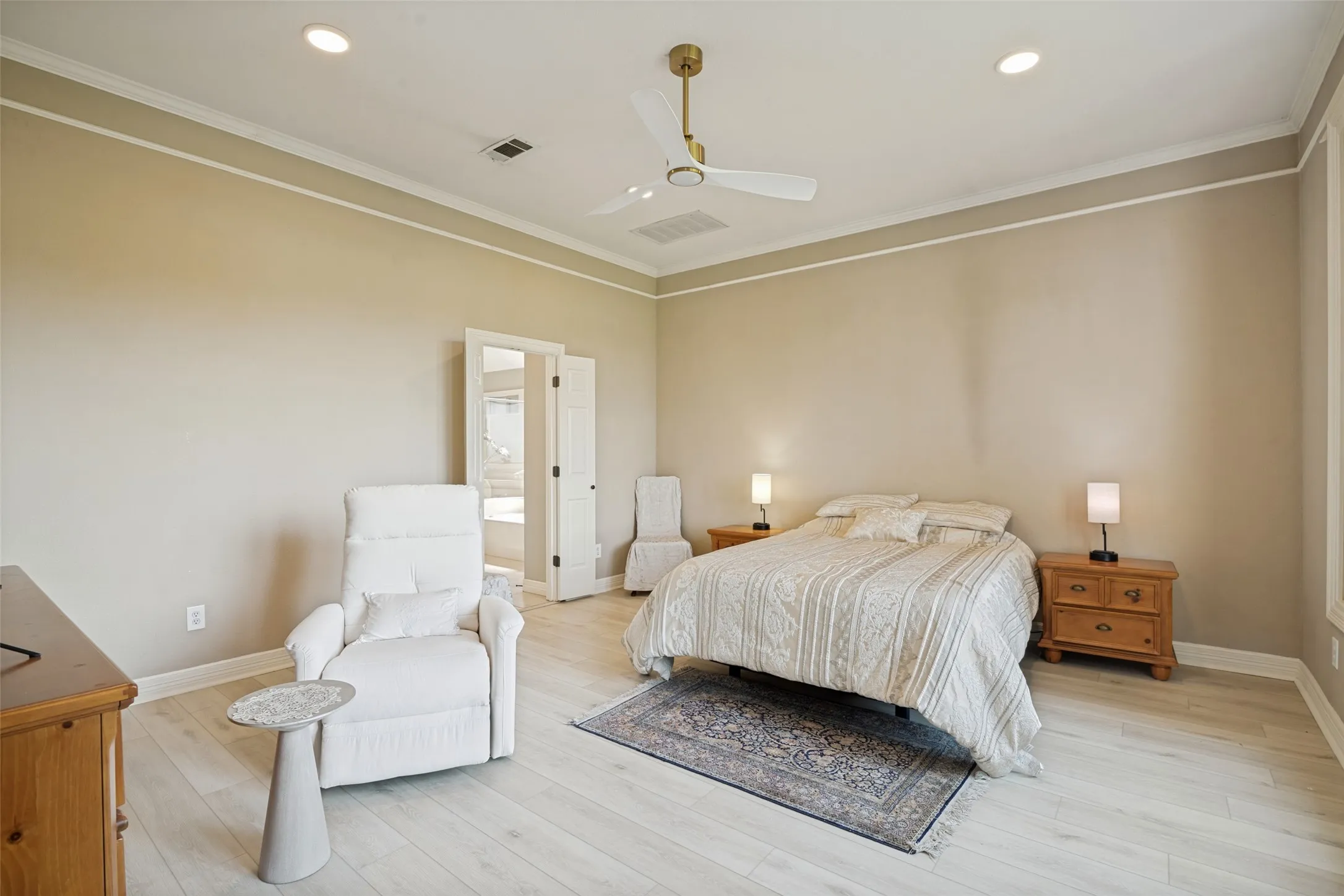 Primary bedroom with a view of the golf course.