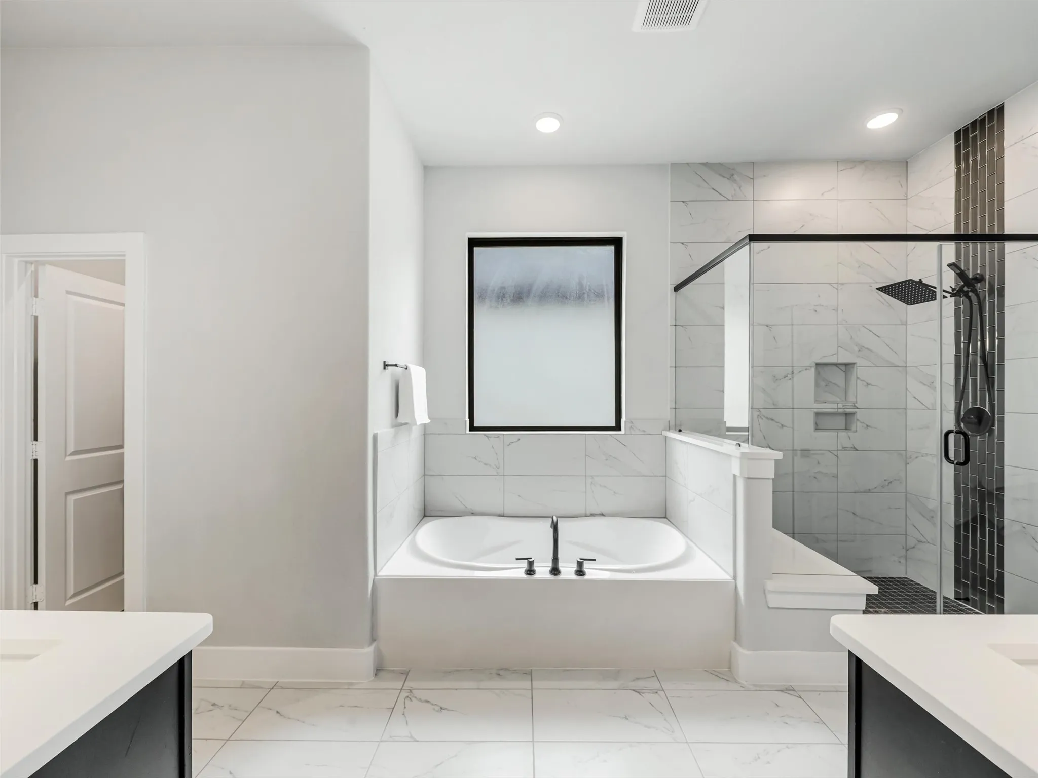 Primary Bath with Rain Shower, Soaking tub,  Double Vanities, abundant storage