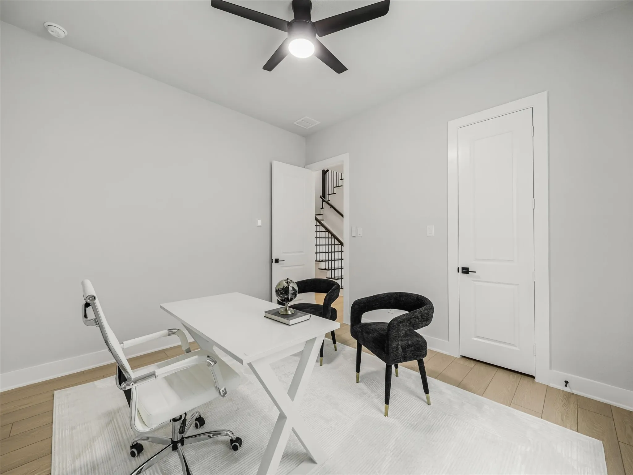 Bedroom #4 with walk-in closet and adjacent full bathroom is currently being used as an office.