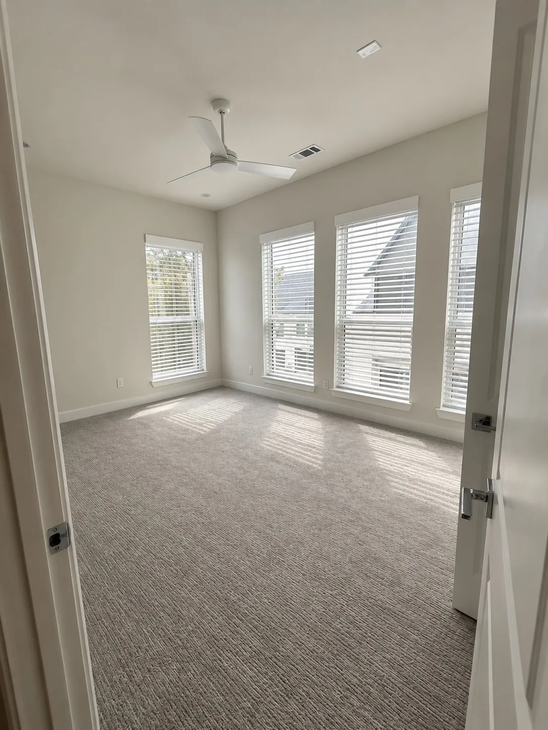 Huge primary with walk in closet. Blinds generated by AI of what is being installed