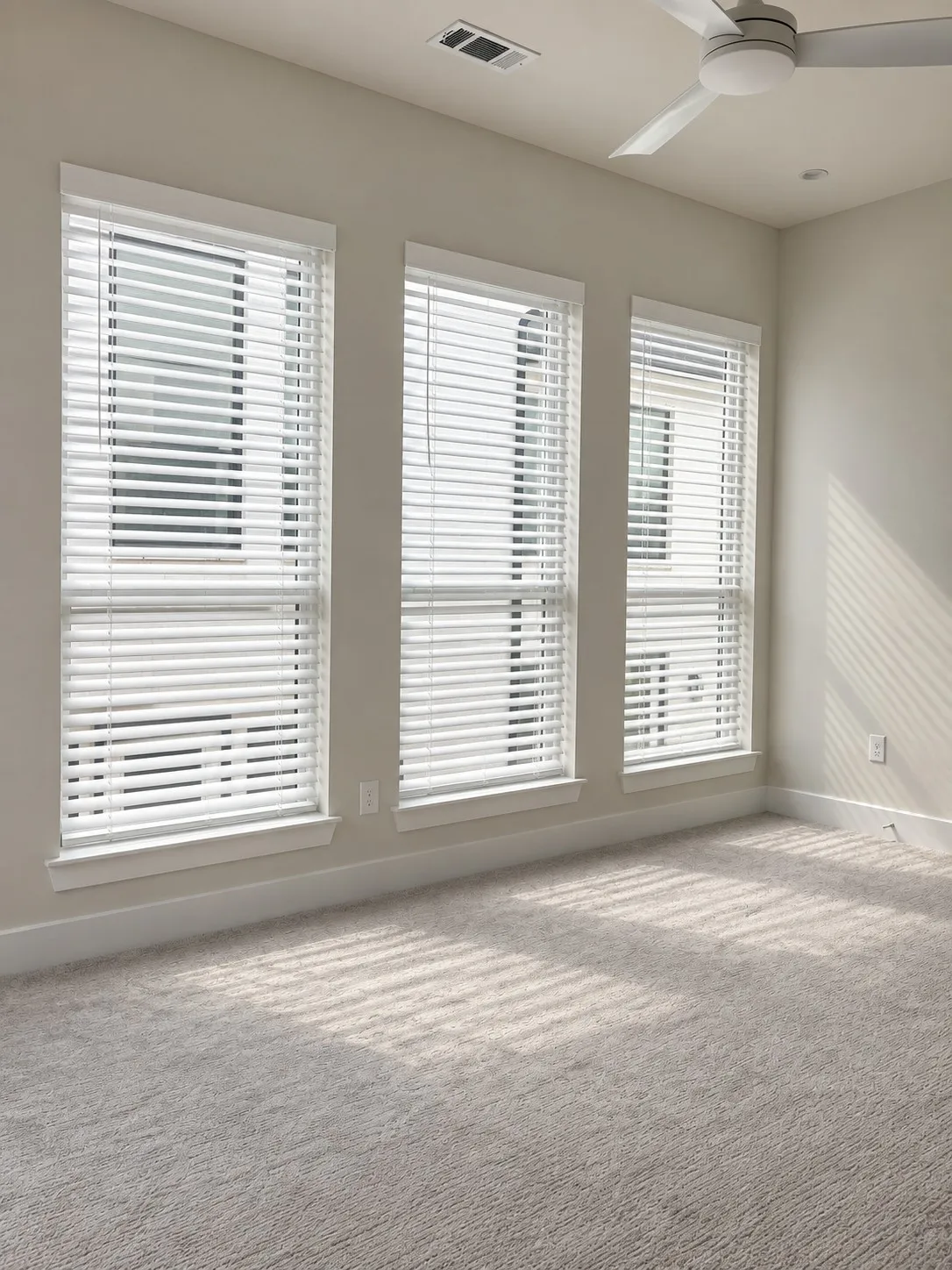 Second bedroom with blinds by AI to show what's being installed