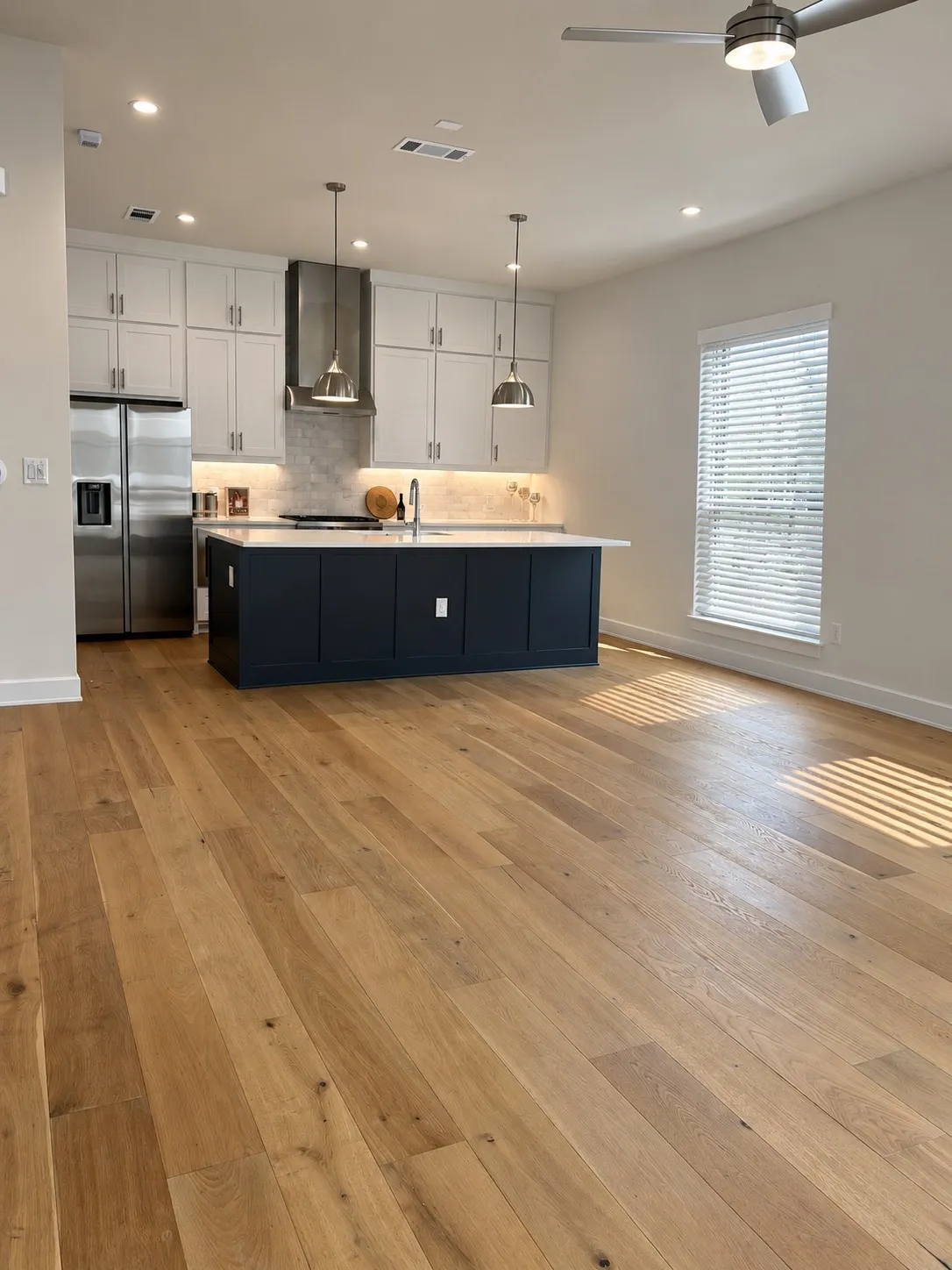 Island is navy blue. Blinds generated by AI of what is being installed.