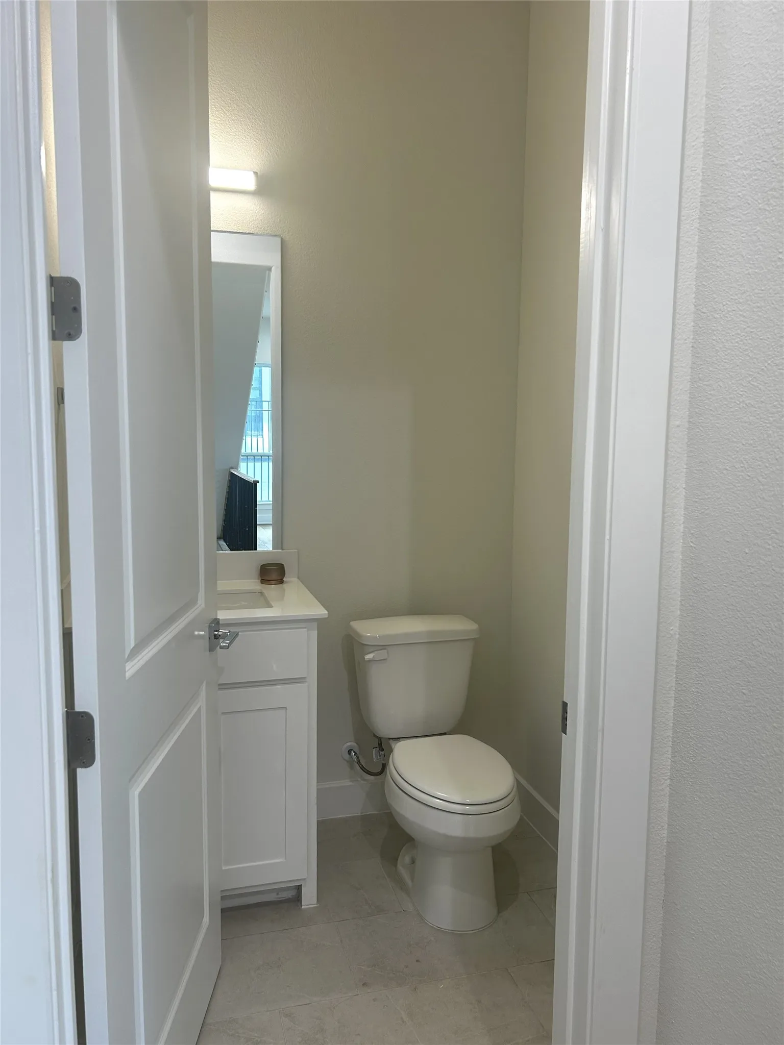 Half bath on second floor near kitchen