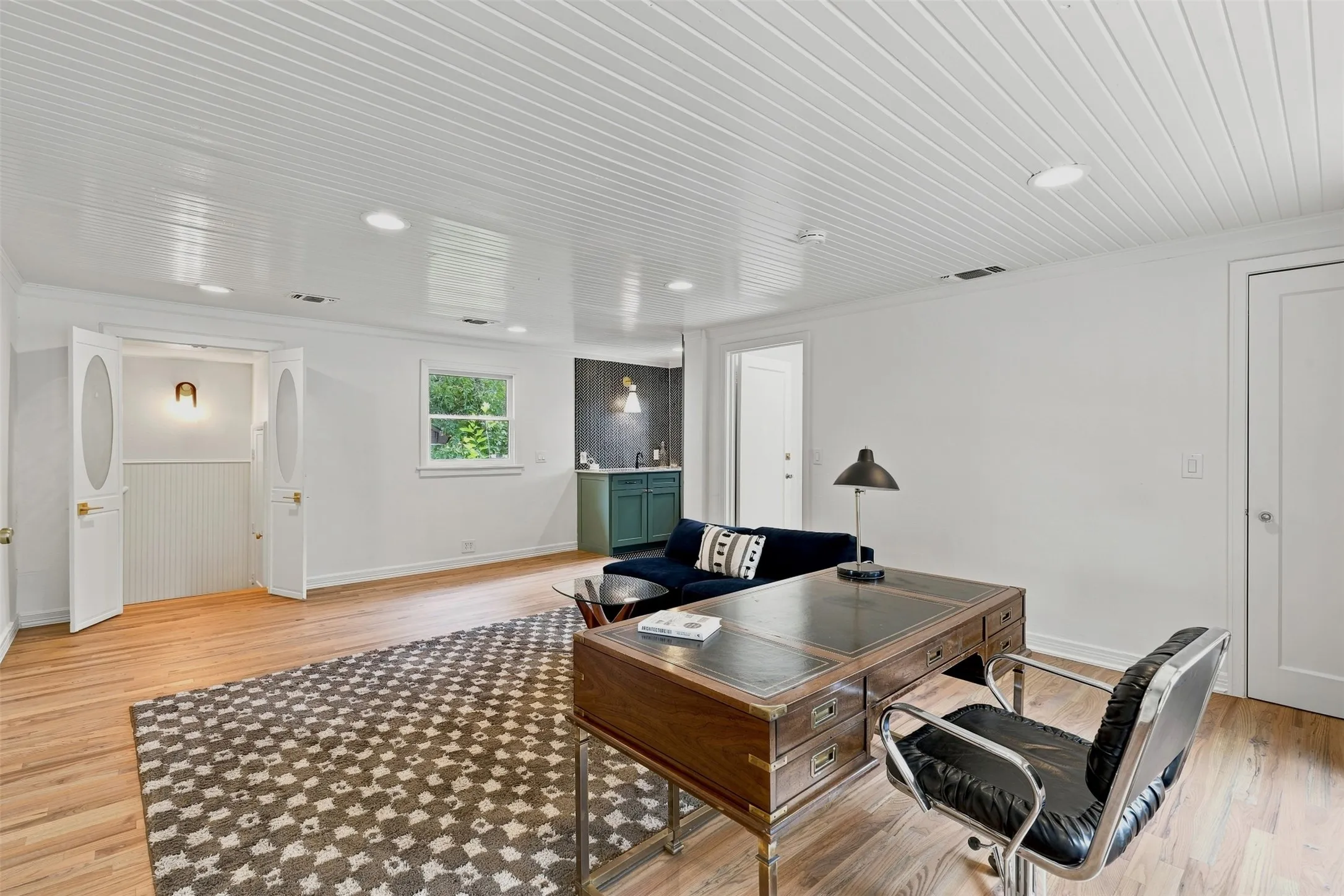 Private guest quarters offers a spacious and versatile living area with a separate entrance, creating an ideal retreat for overnight guests.