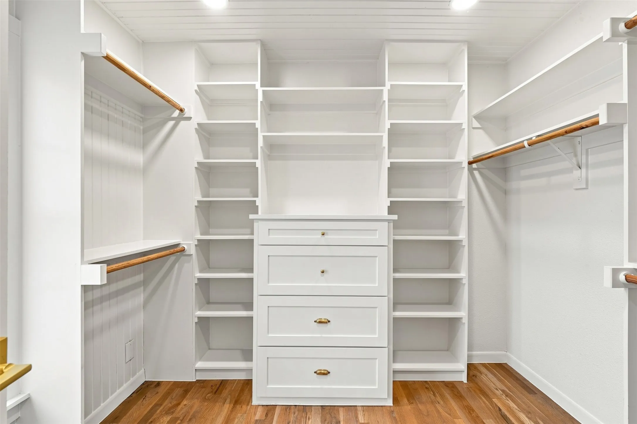 Custom built closet with California inspired custom dresser